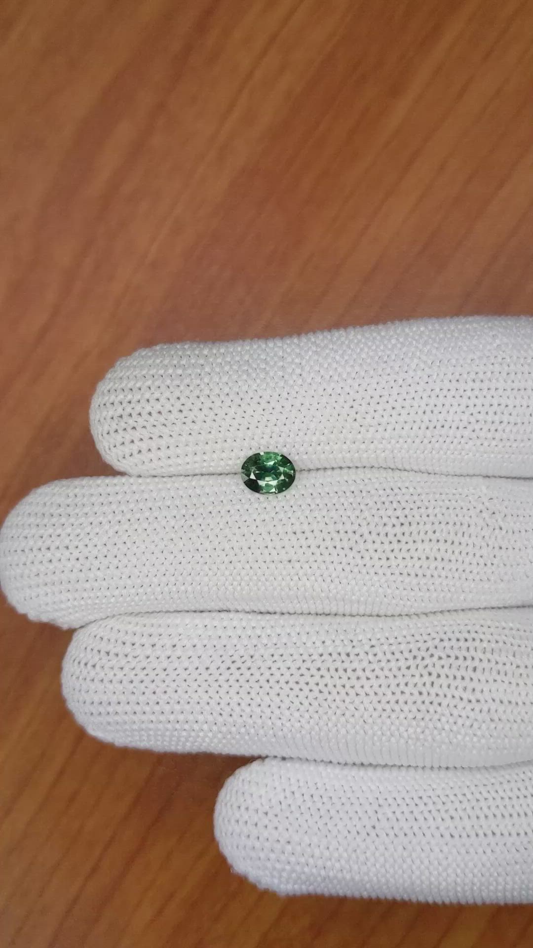 0.71 Ct. Bluish Green Sapphire from Madagascar Size Video