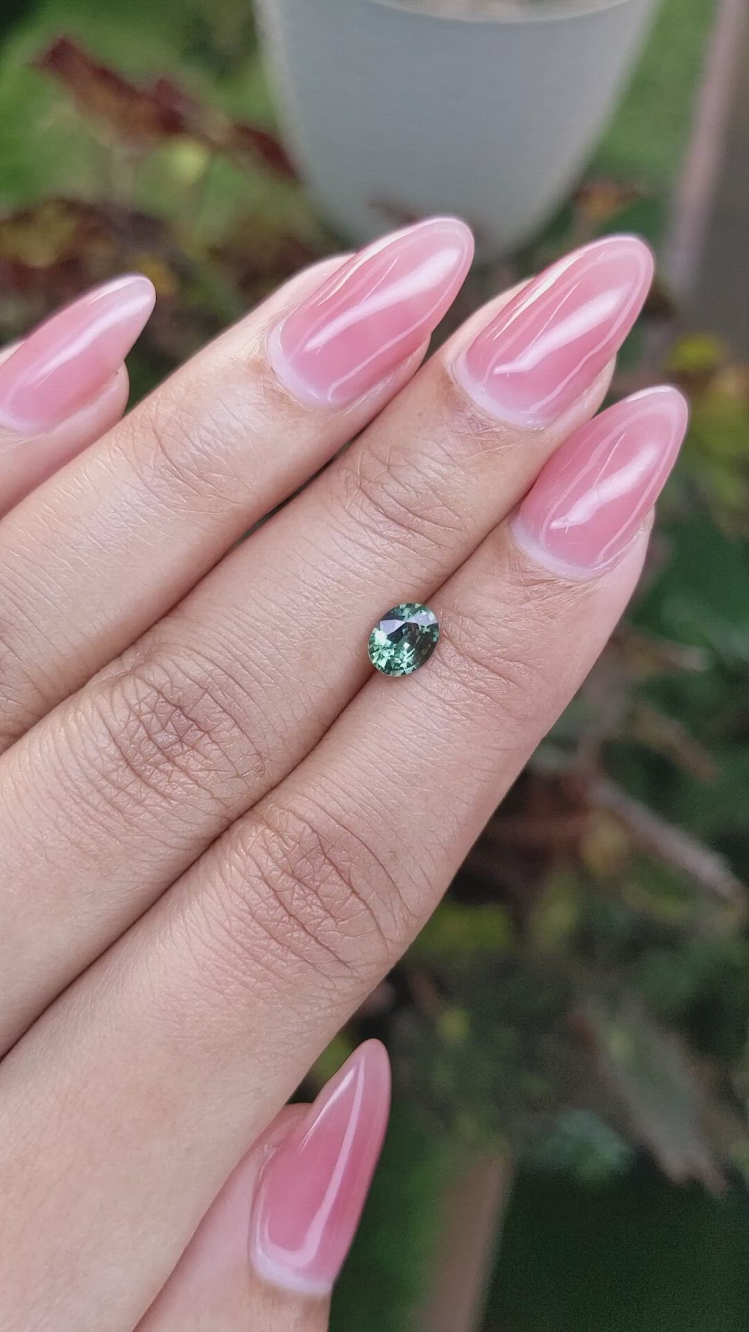0.71 Ct. Bluish Green Sapphire from Madagascar Size Video