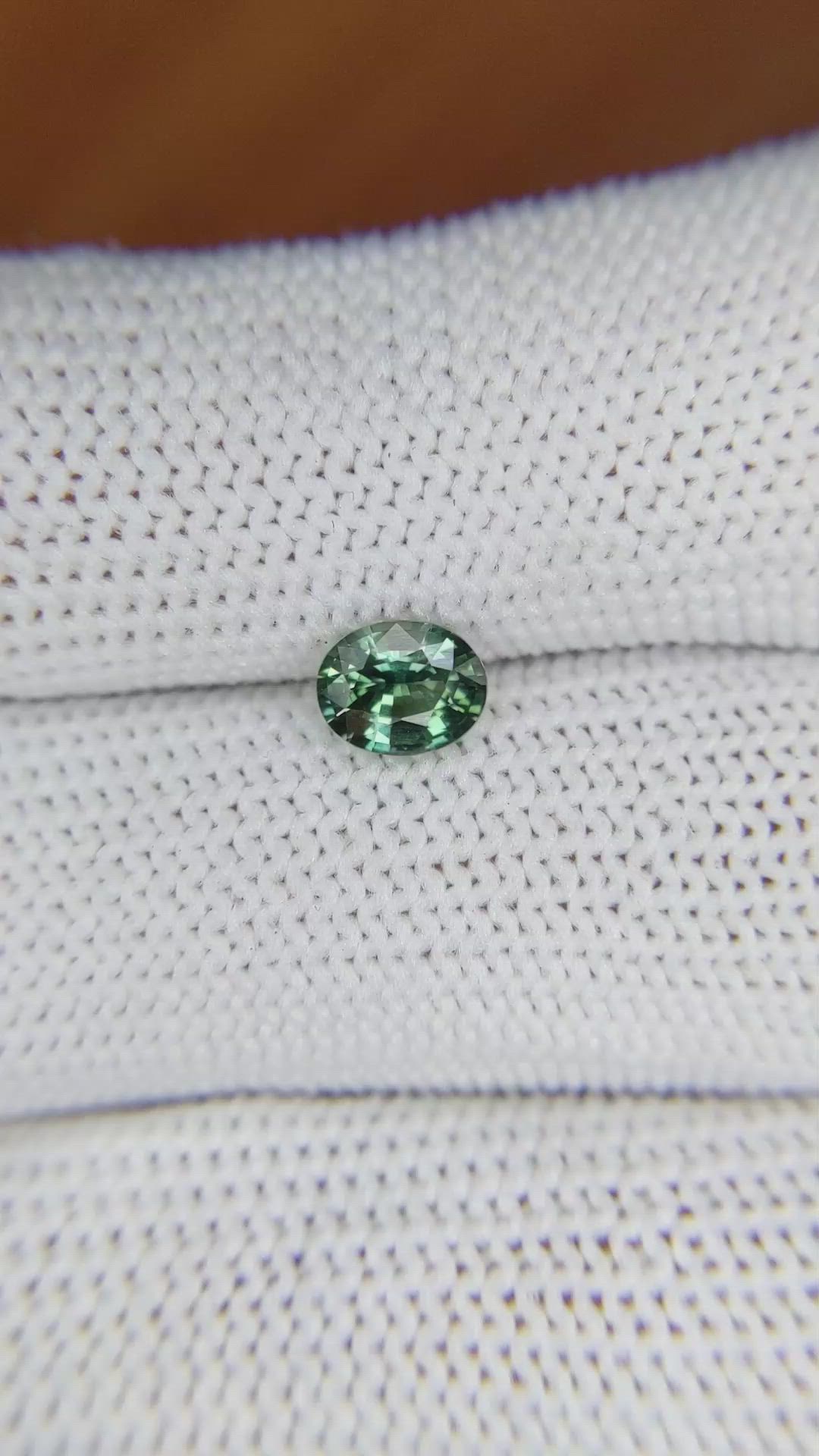 0.71 Ct. Bluish Green Sapphire from Madagascar Size Video