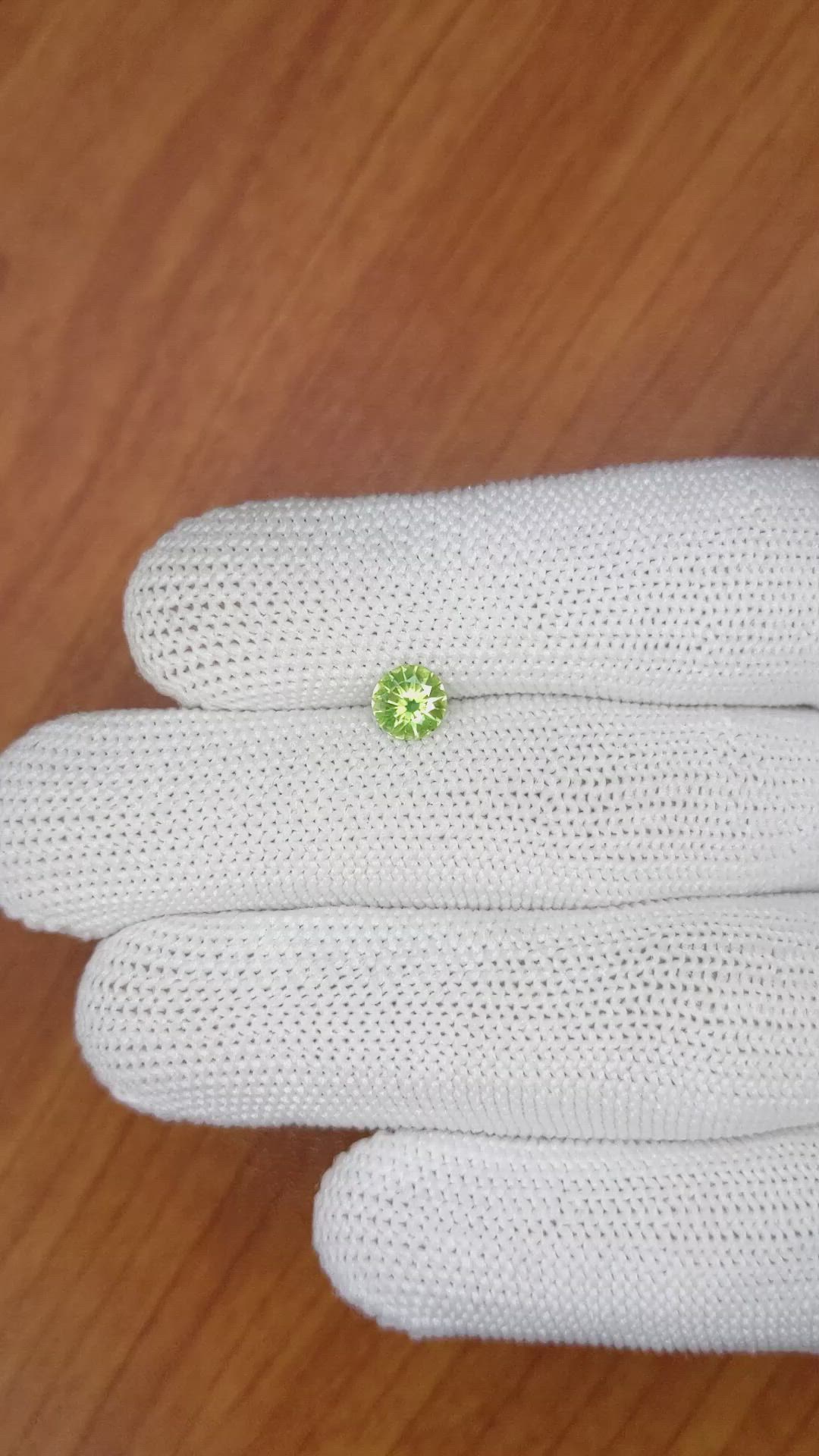 0.65 Ct. Yellowish Green Sapphire from Madagascar Size Video