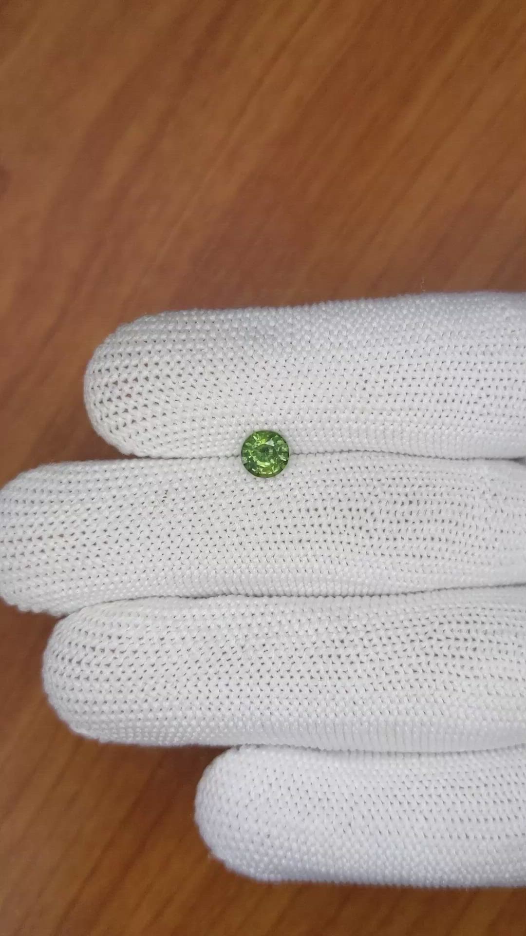 0.75 Ct. Yellowish Green Sapphire from Madagascar Size Video