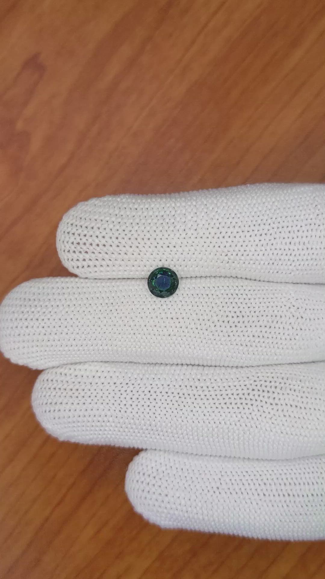 0.79 Ct. Greenish Blue Sapphire from Madagascar Size Video