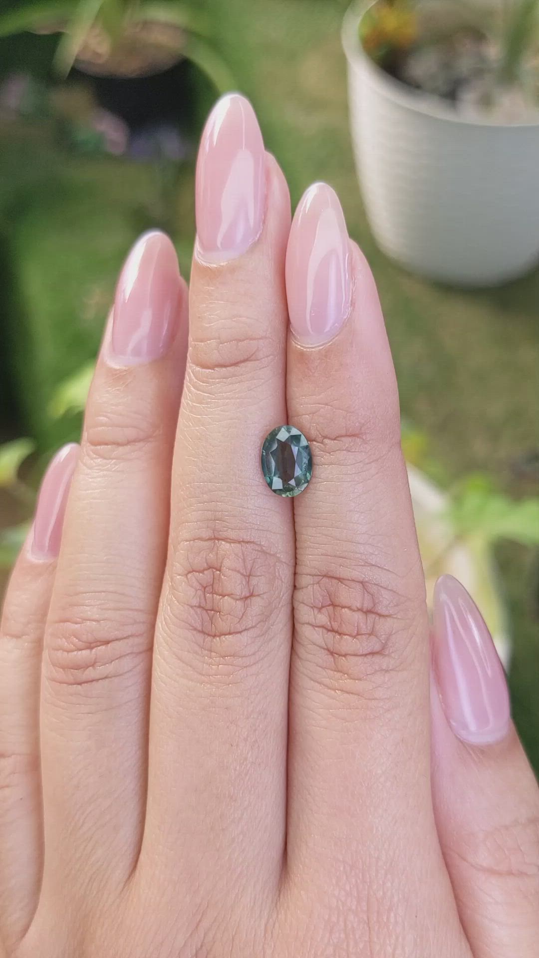 1.41 Ct. Bluish Green Sapphire from Madagascar Size Video