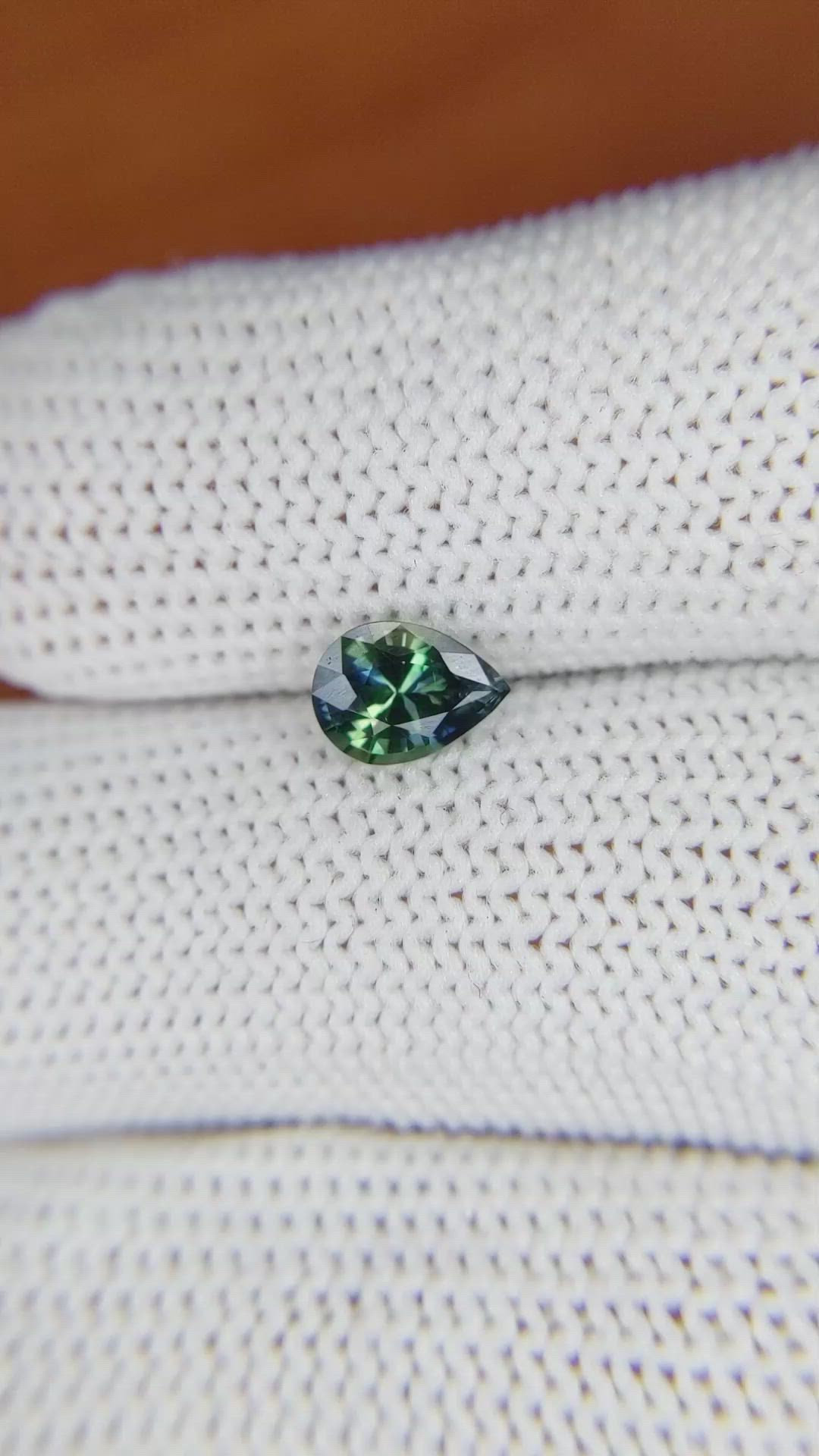 0.81 Ct. Bluish Green Sapphire from Madagascar Size Video