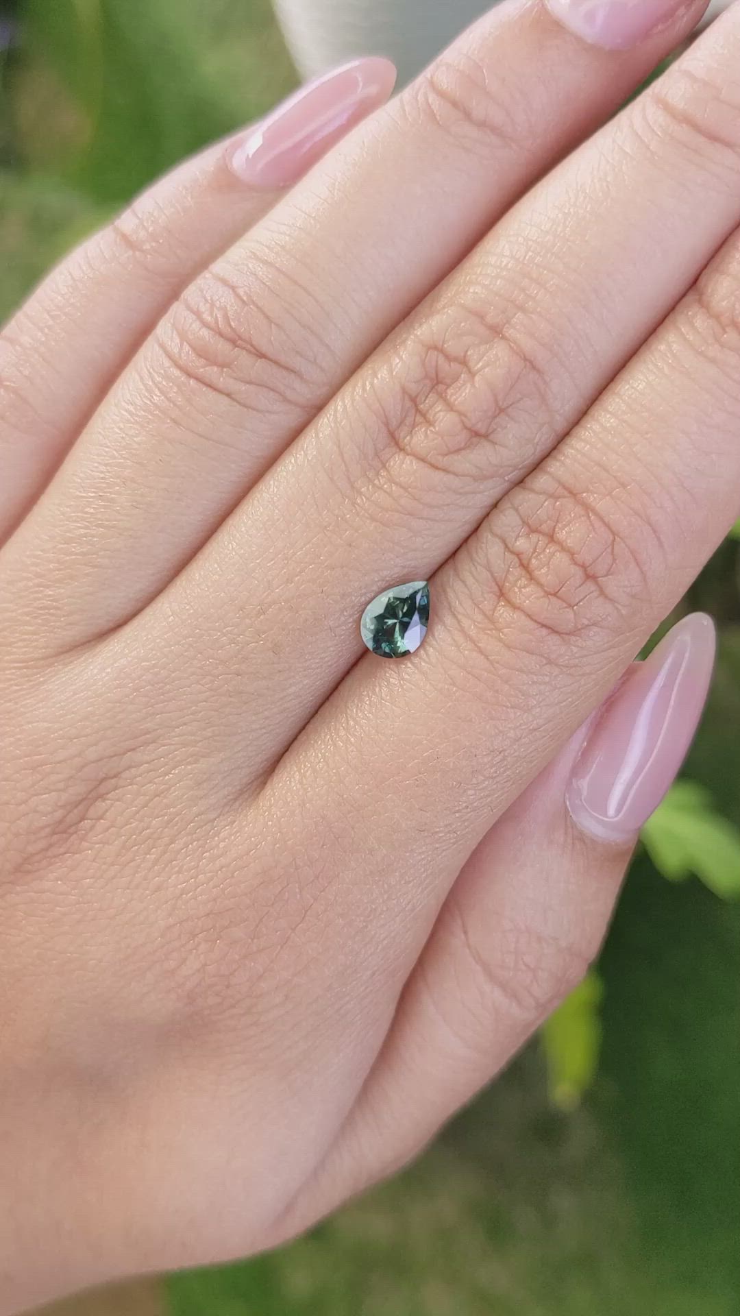 0.81 Ct. Bluish Green Sapphire from Madagascar Size Video