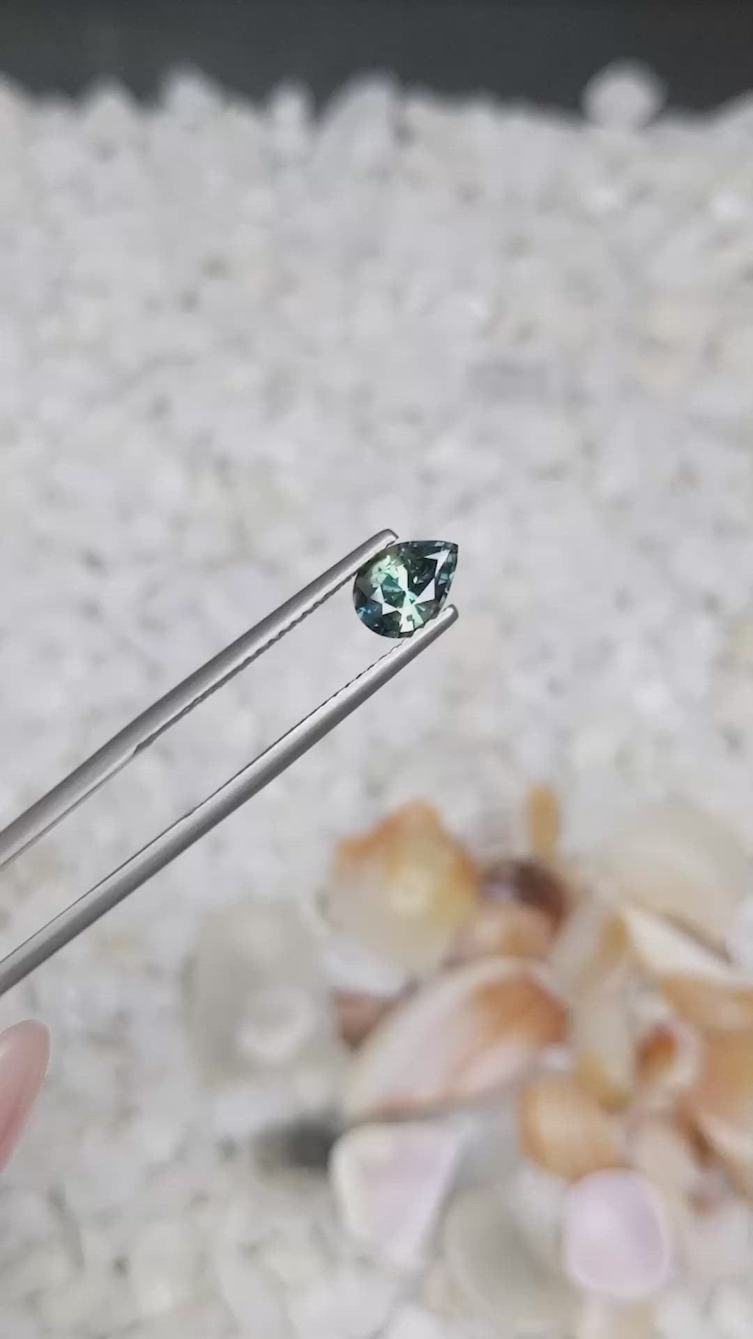 0.81 Ct. Bluish Green Sapphire from Madagascar Size Video