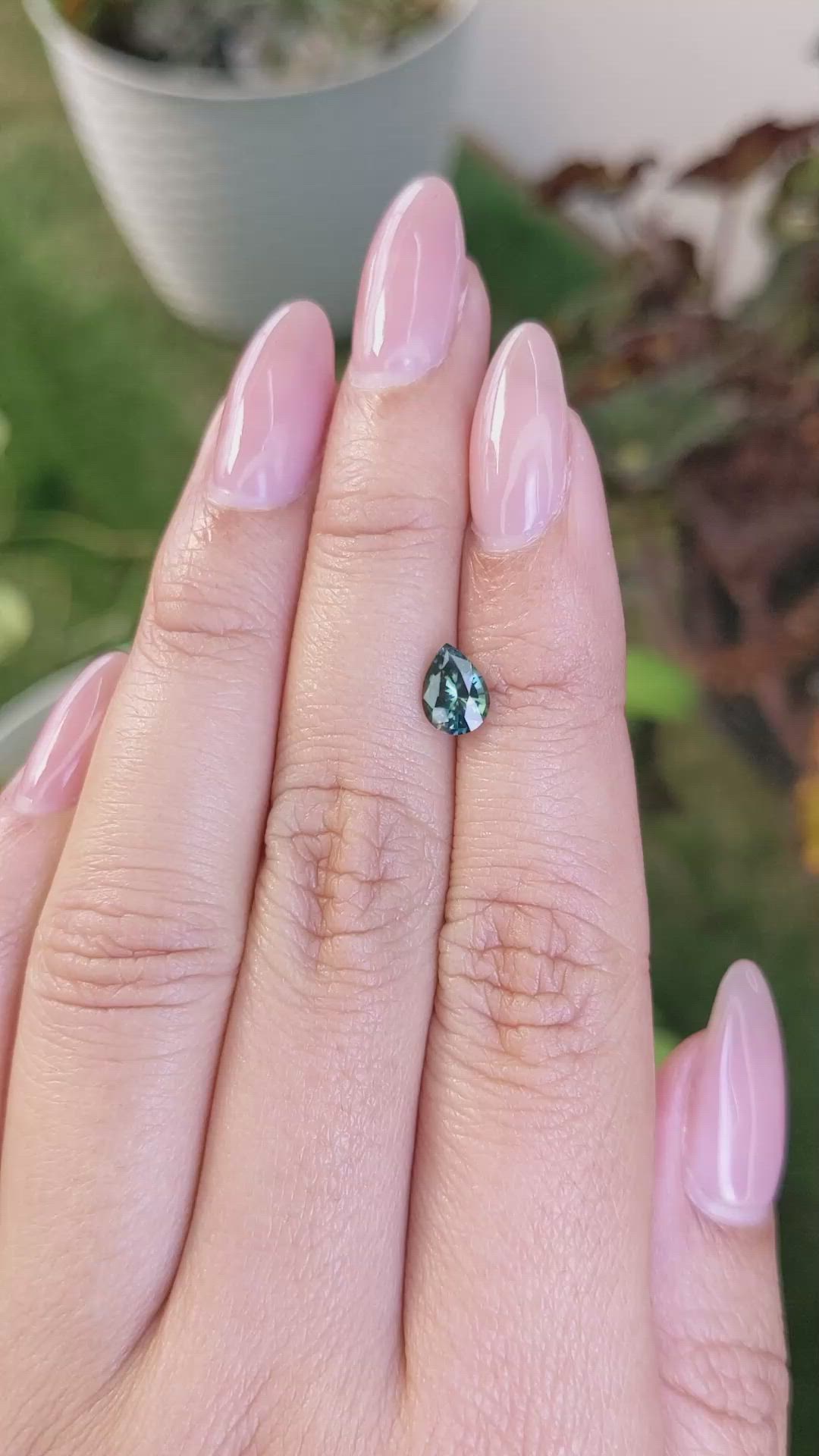 0.81 Ct. Bluish Green Sapphire from Madagascar Size Video