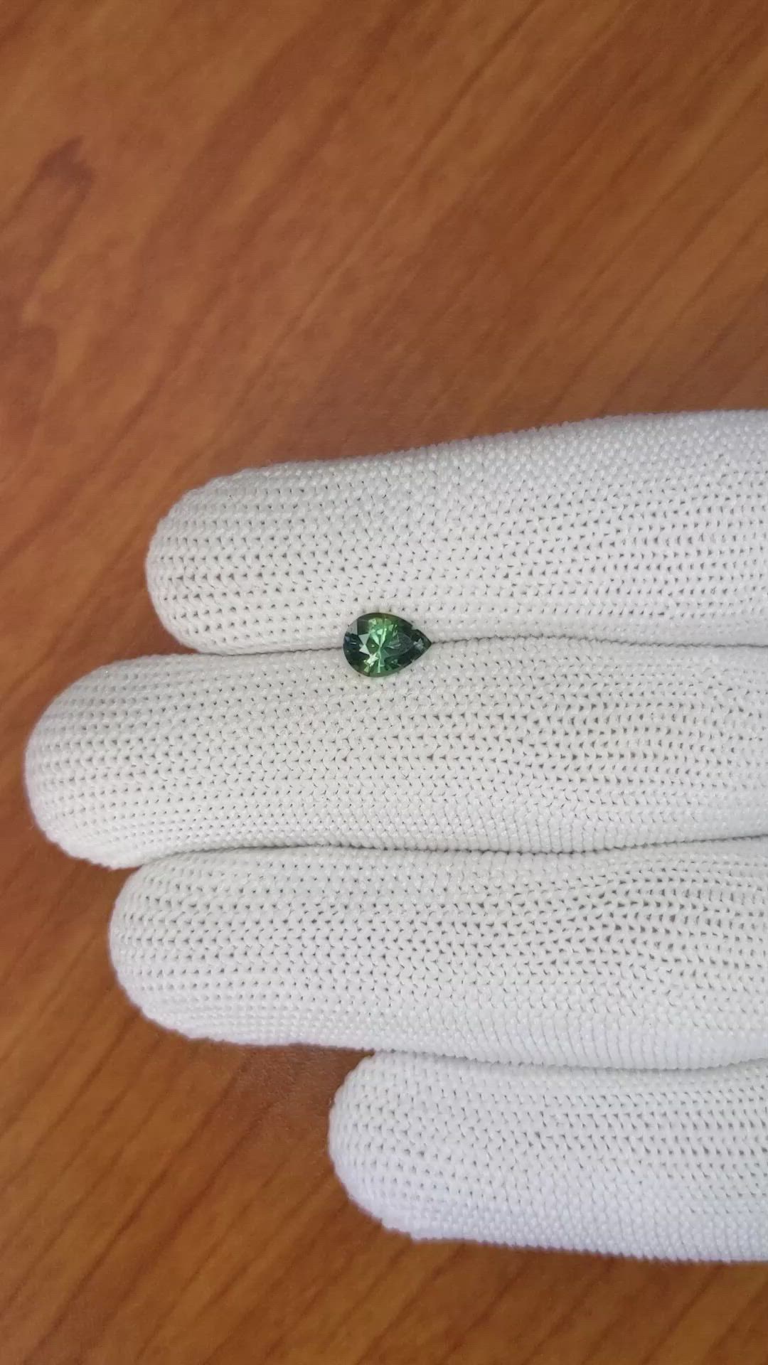 0.81 Ct. Bluish Green Sapphire from Madagascar Size Video