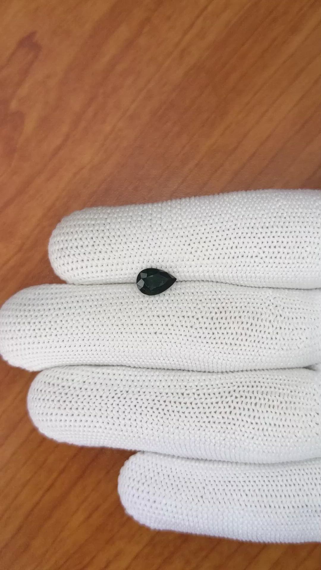 1.31 Ct. Bluish Green Sapphire from Madagascar Size Video