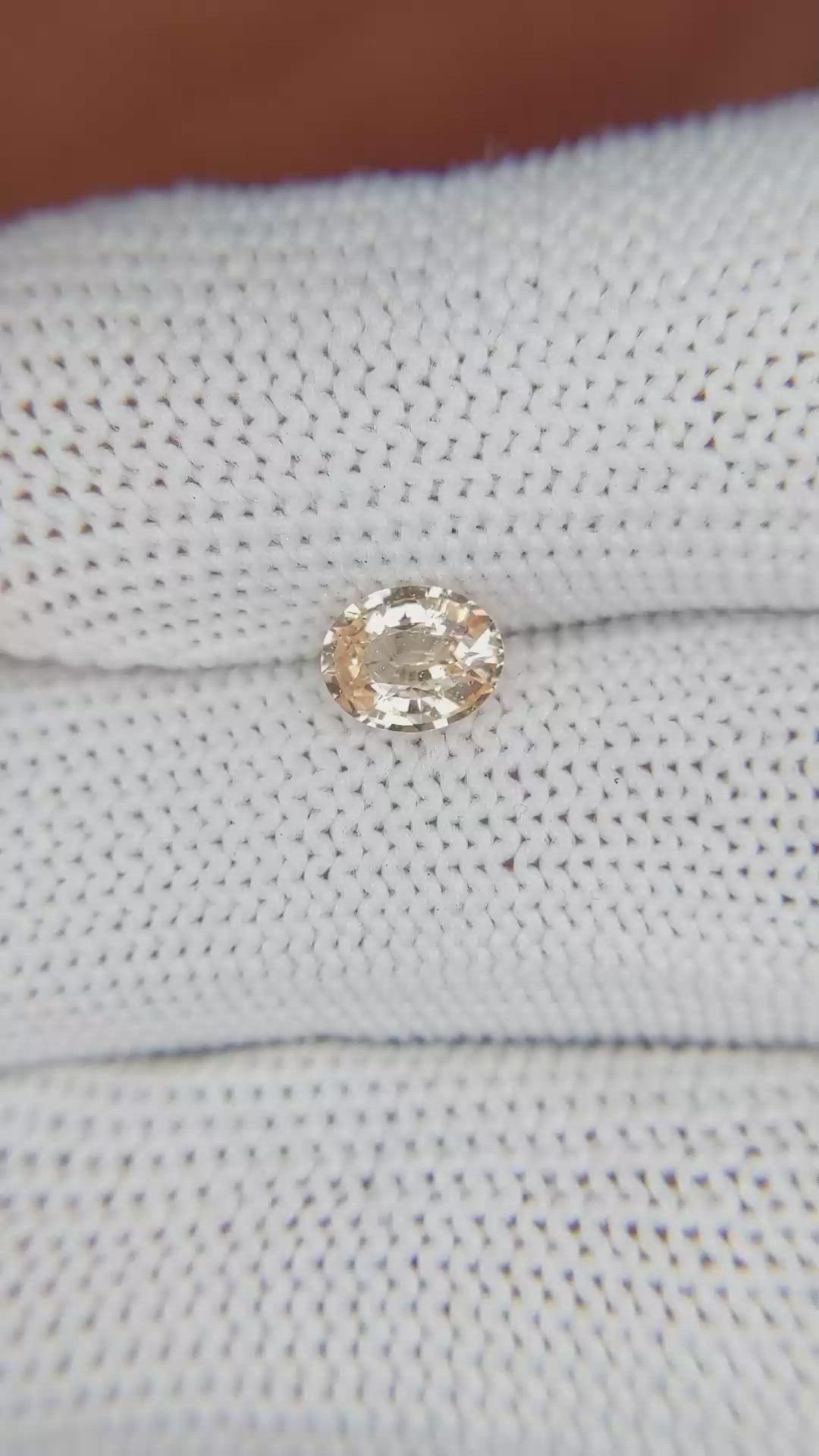 0.90 Ct. Peach Sapphire from Ceylon (Sri Lanka) Size Video