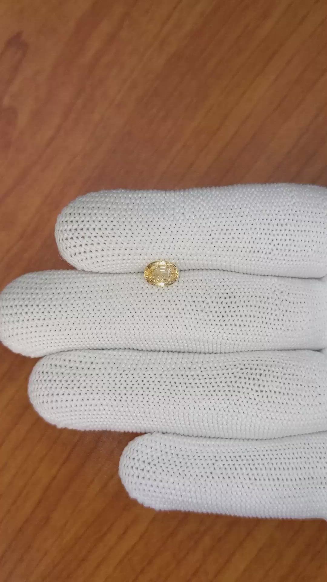 0.94 Ct. Orangish Yellow Sapphire from Ceylon (Sri Lanka) Size Video