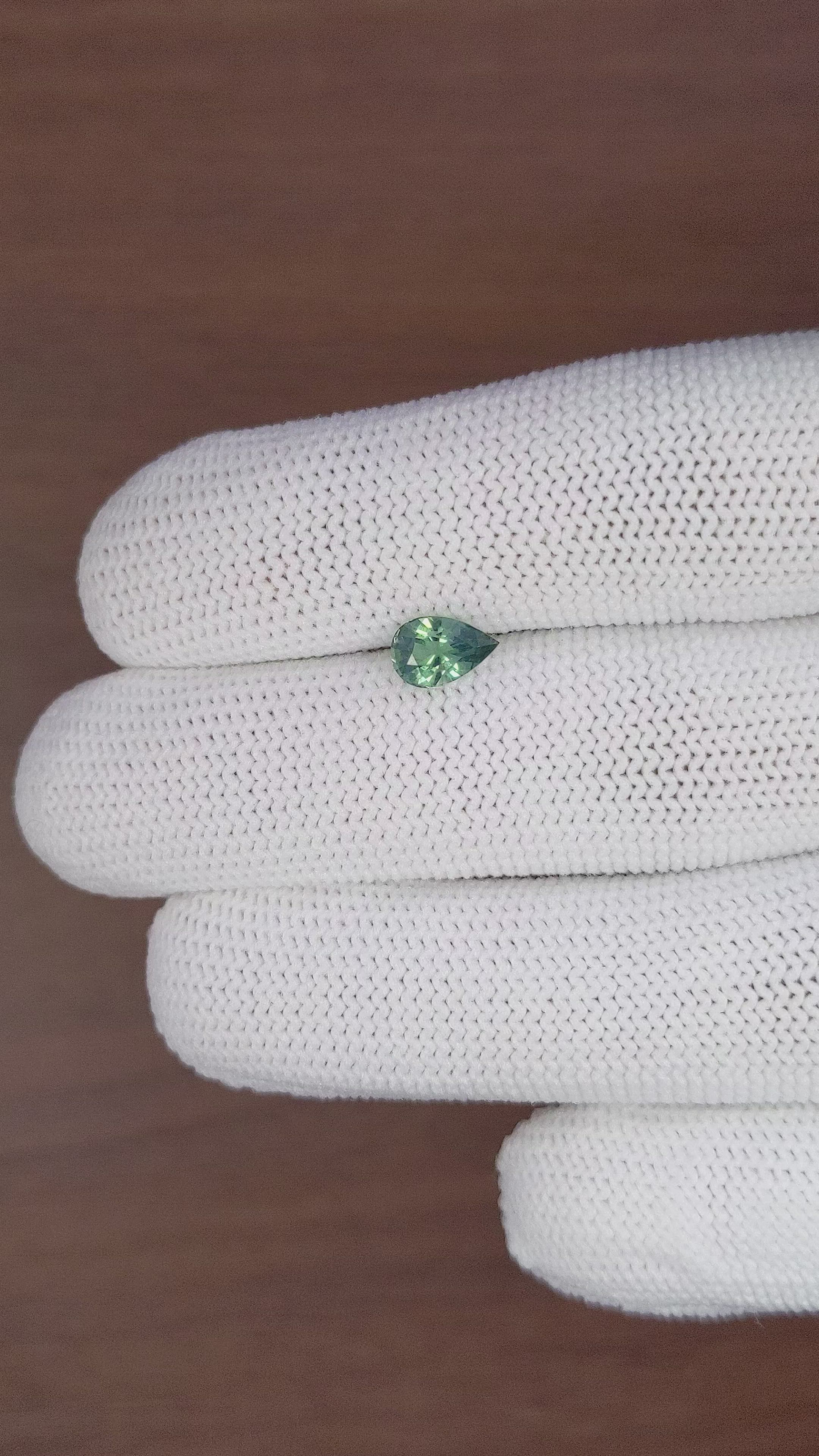 1.06 Ct. Bluish Green Sapphire from Madagascar Size Video