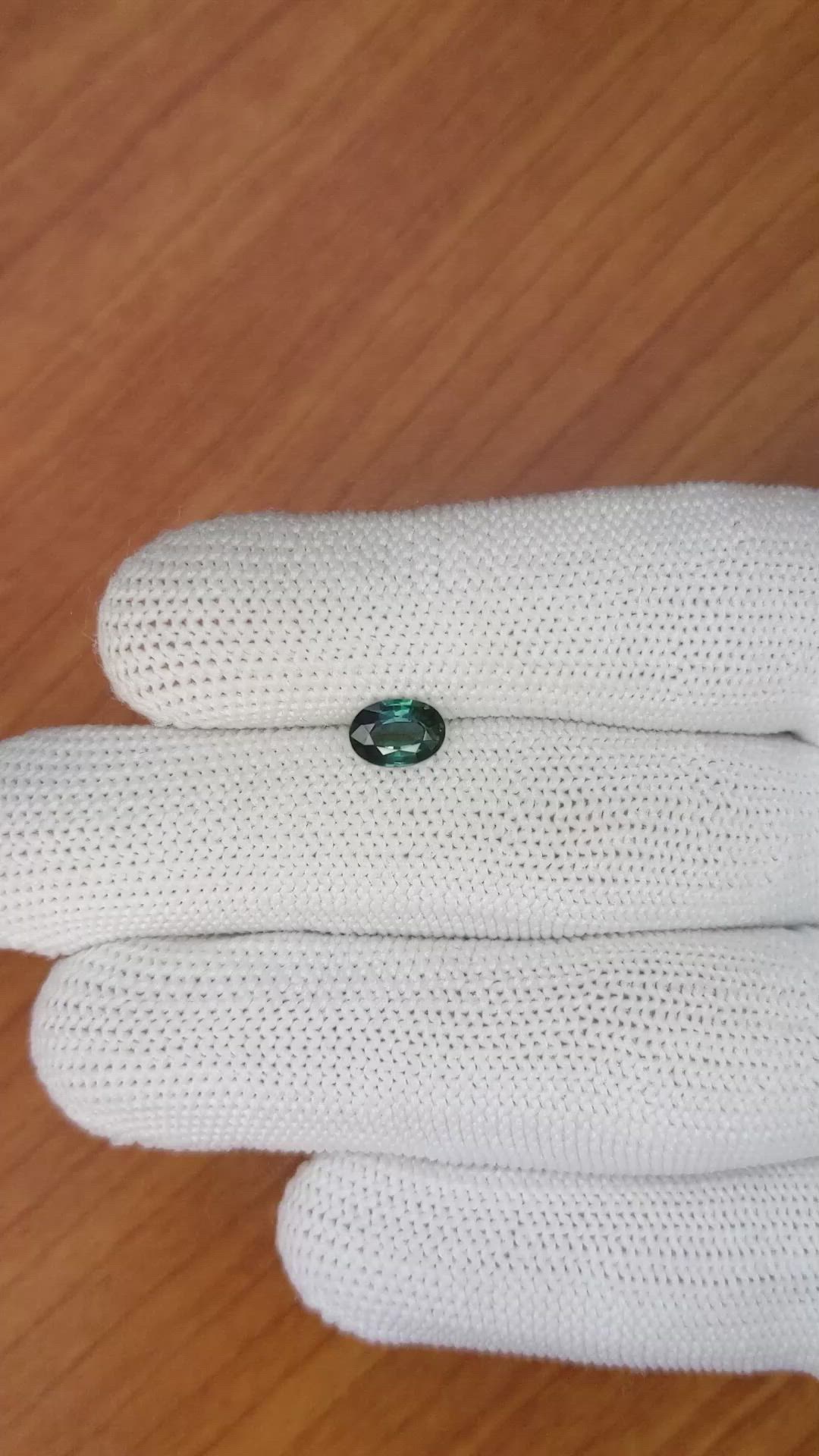 0.86 Ct. Bluish Green Sapphire from Madagascar Size Video