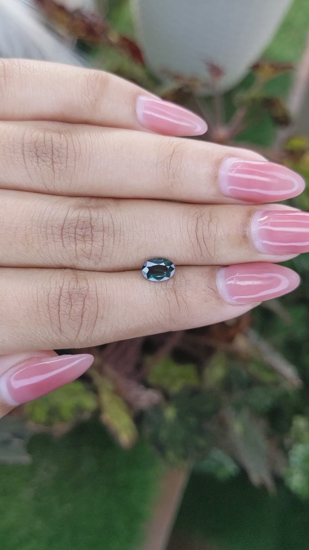 0.86 Ct. Bluish Green Sapphire from Madagascar Size Video