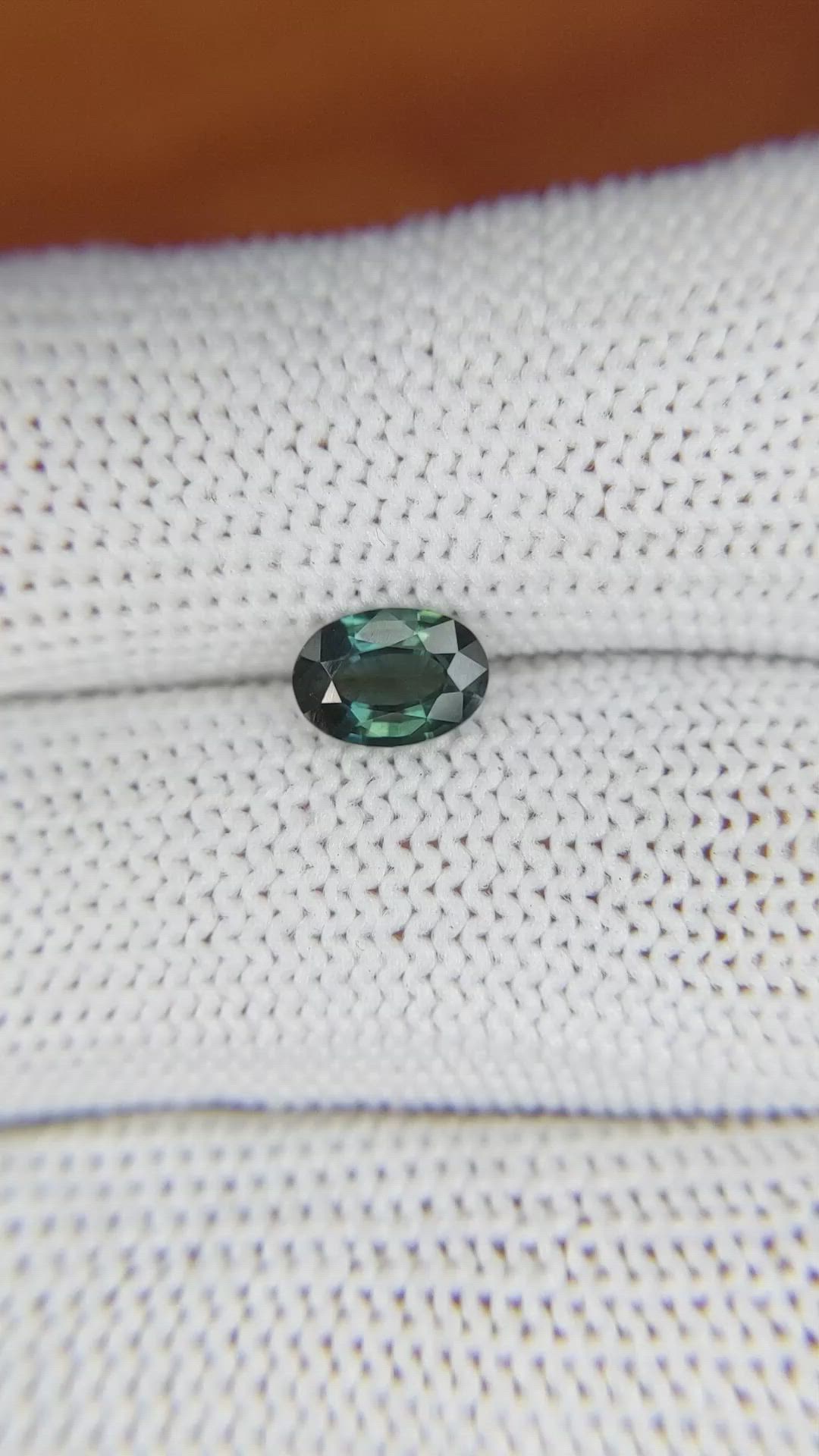 0.86 Ct. Bluish Green Sapphire from Madagascar Size Video
