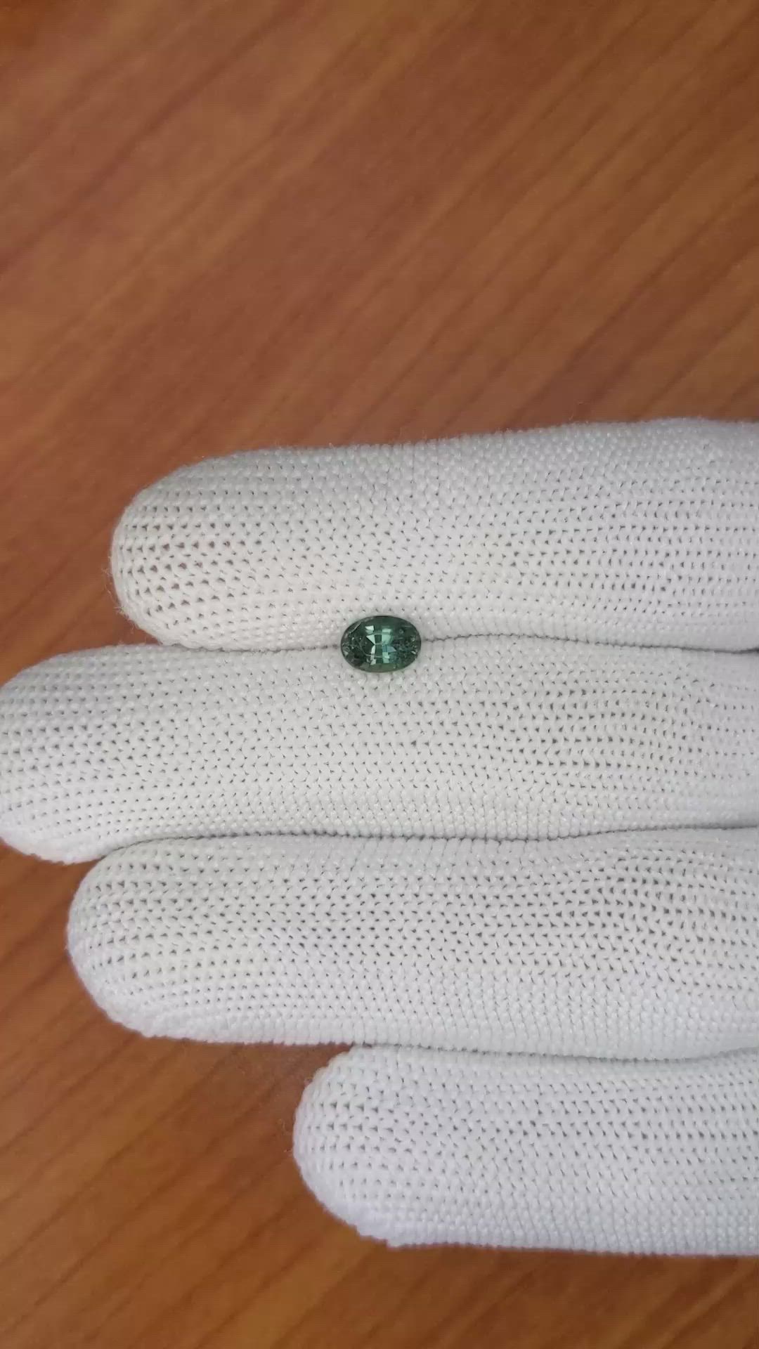 0.96 Ct. Bluish Green Sapphire from Madagascar Size Video