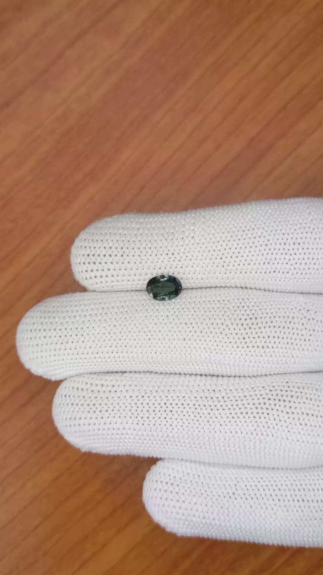 0.79 Ct. Greenish Blue Sapphire from Madagascar Size Video
