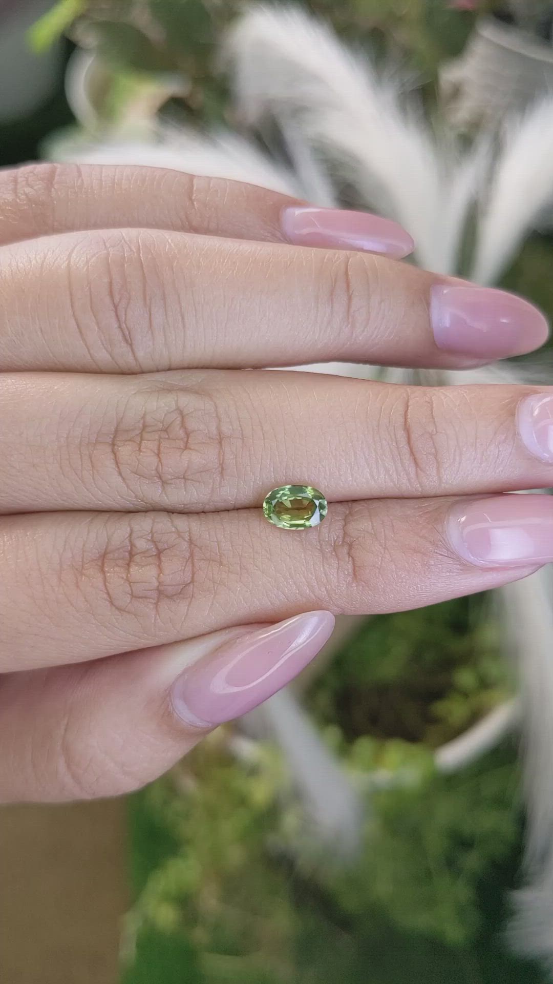 0.99 Ct. Yellowish Green Sapphire from Madagascar Size Video