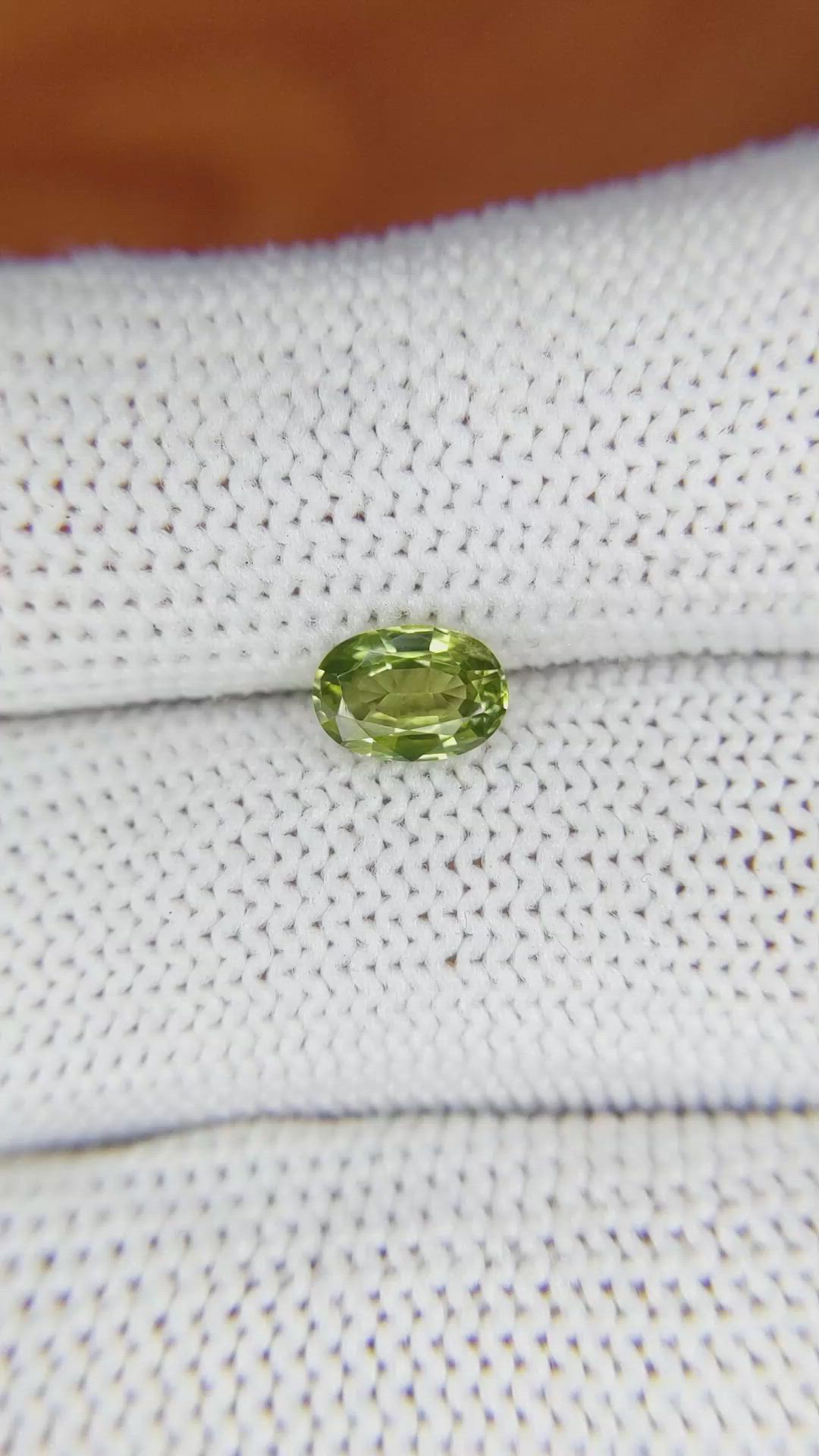 0.99 Ct. Yellowish Green Sapphire from Madagascar Size Video