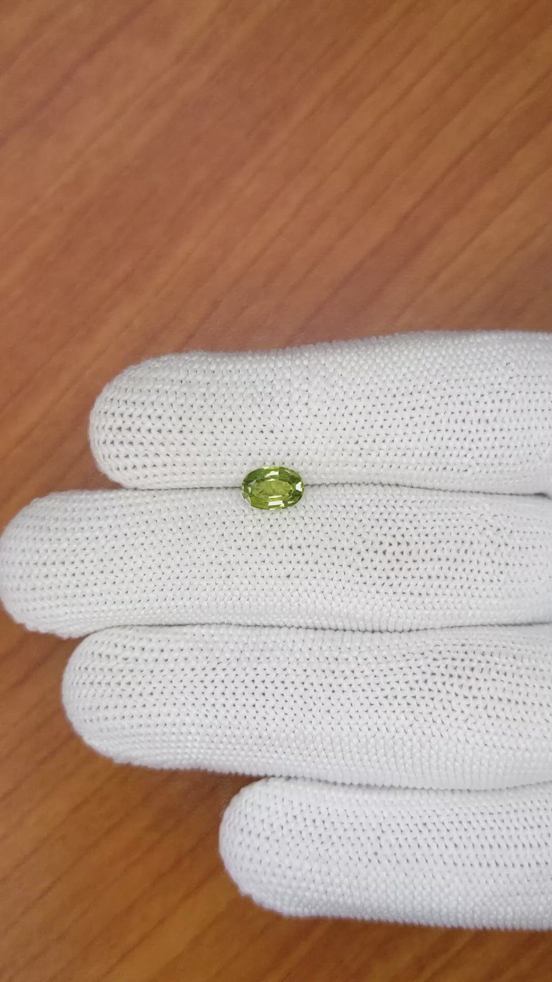 0.99 Ct. Yellowish Green Sapphire from Madagascar Size Video