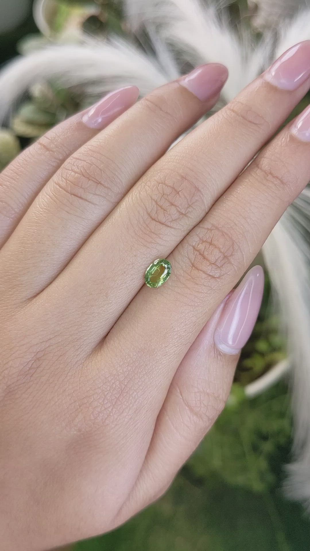 0.99 Ct. Yellowish Green Sapphire from Madagascar Size Video