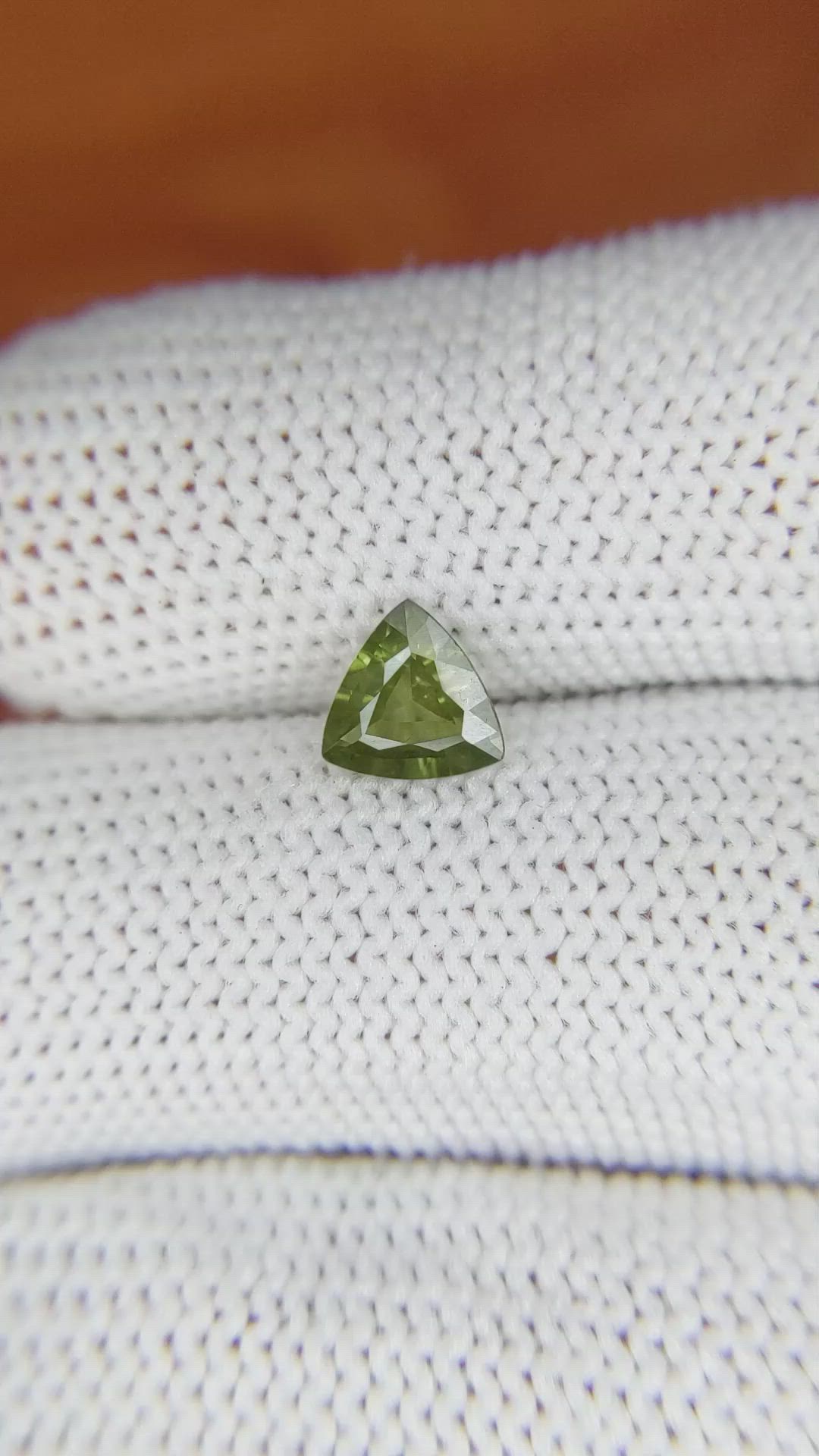 0.81 Ct. Yellowish Green Sapphire from Madagascar Size Video