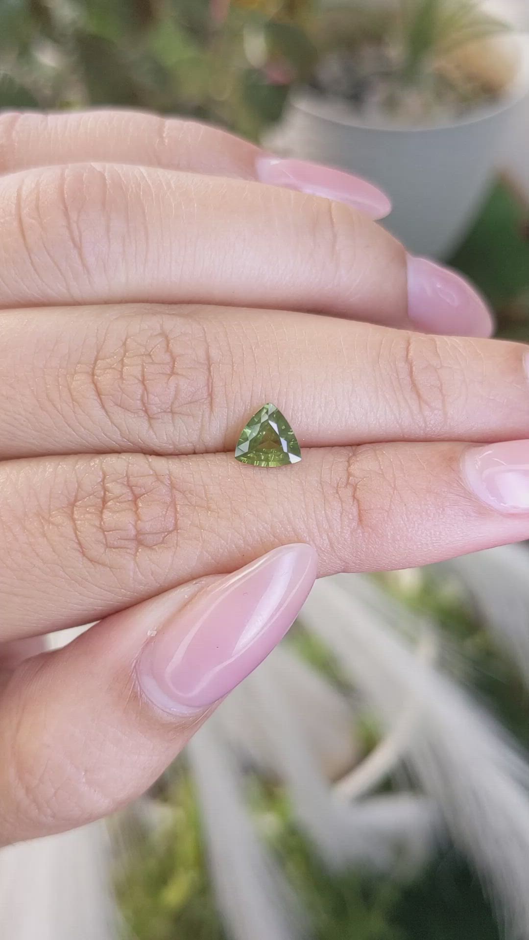 0.81 Ct. Yellowish Green Sapphire from Madagascar Size Video