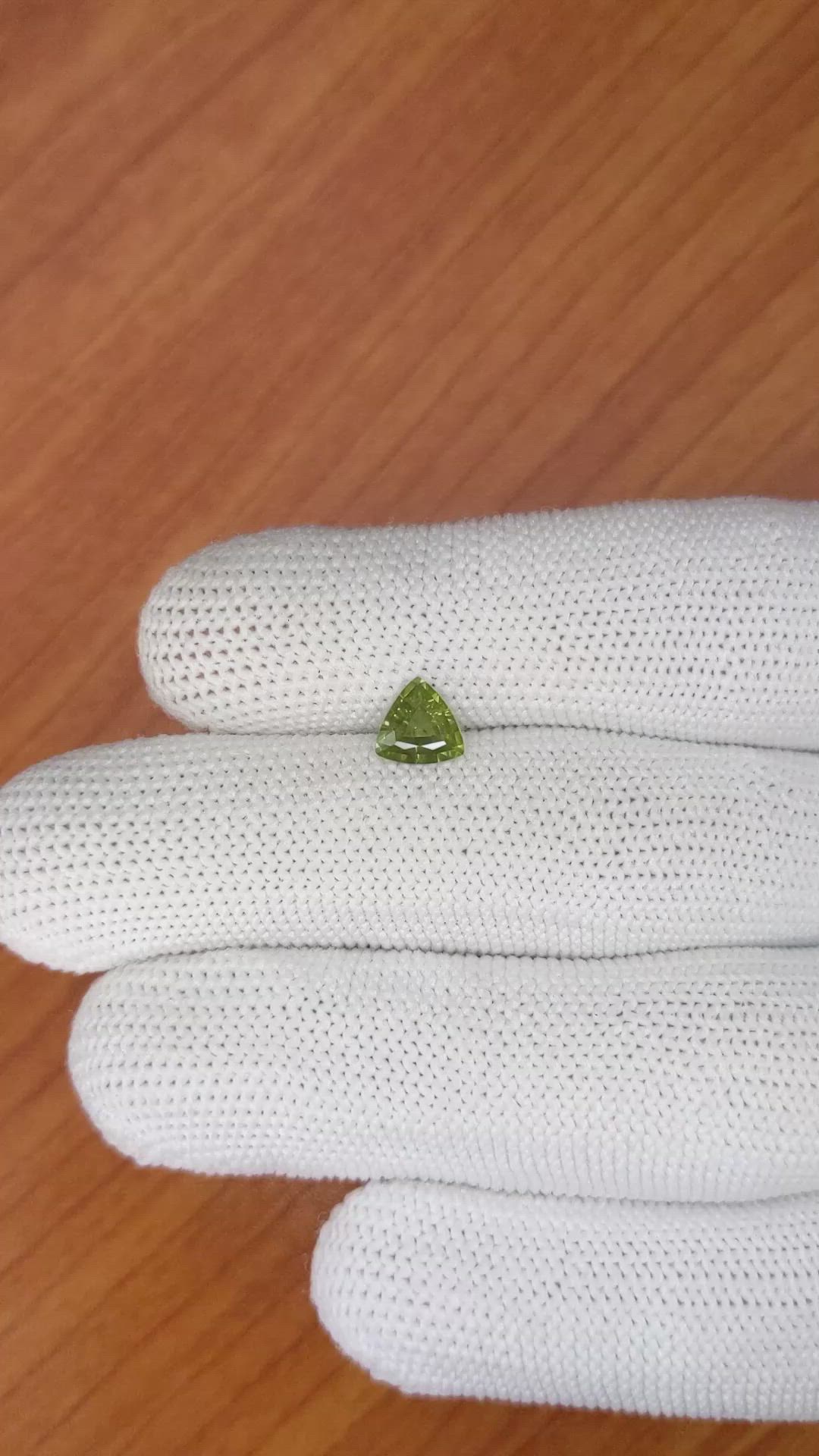 0.81 Ct. Yellowish Green Sapphire from Madagascar Size Video
