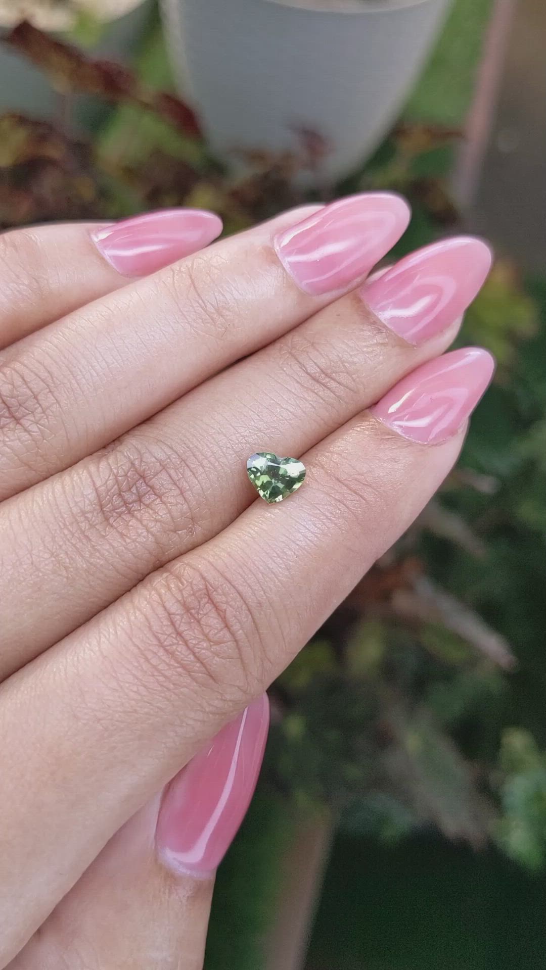 0.88 Ct. Yellowish Green Sapphire from Madagascar Size Video