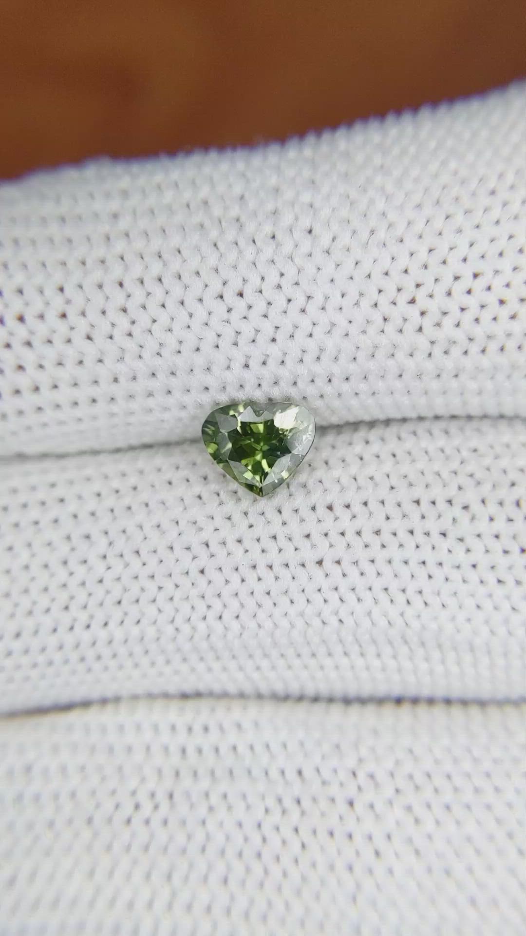 0.88 Ct. Yellowish Green Sapphire from Madagascar Size Video