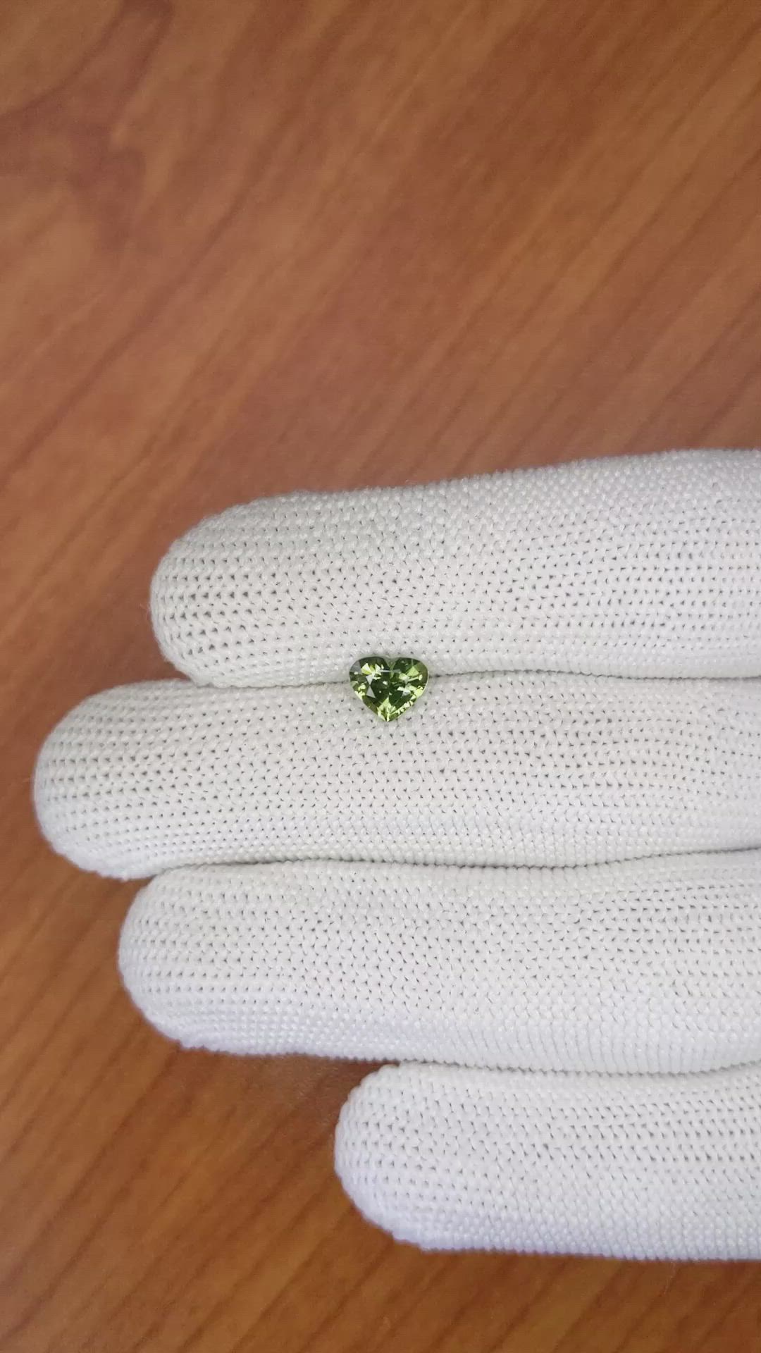 0.88 Ct. Yellowish Green Sapphire from Madagascar Size Video