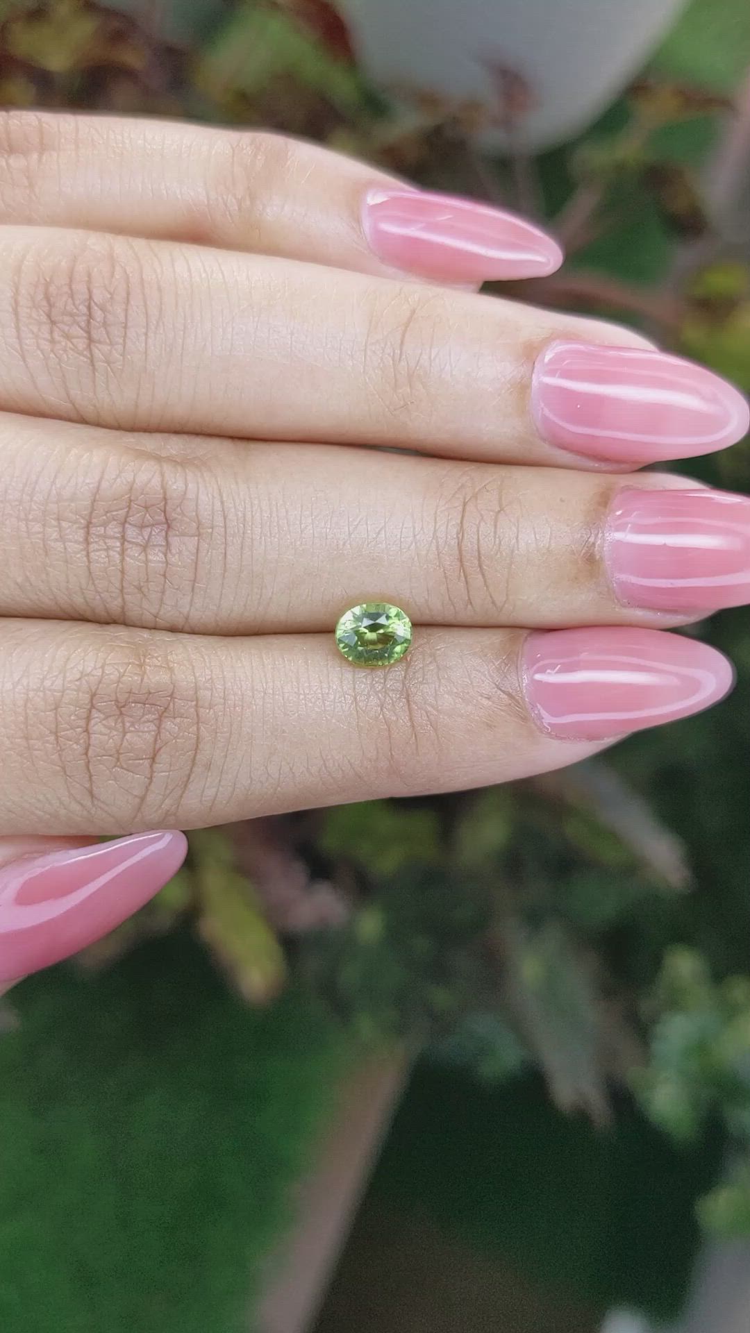 0.86 Ct. Yellowish Green Sapphire from Madagascar Size Video