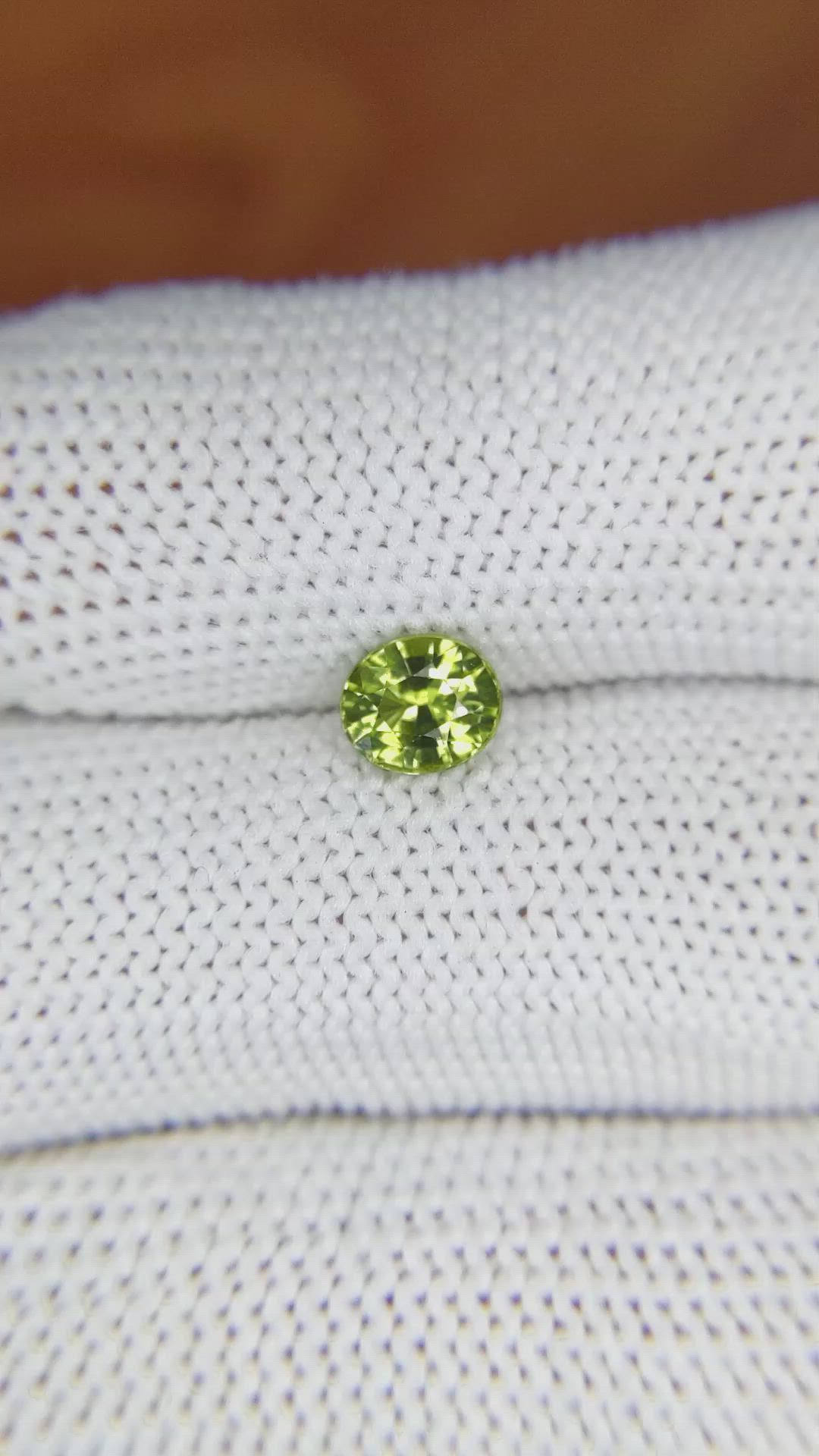 0.86 Ct. Yellowish Green Sapphire from Madagascar Size Video