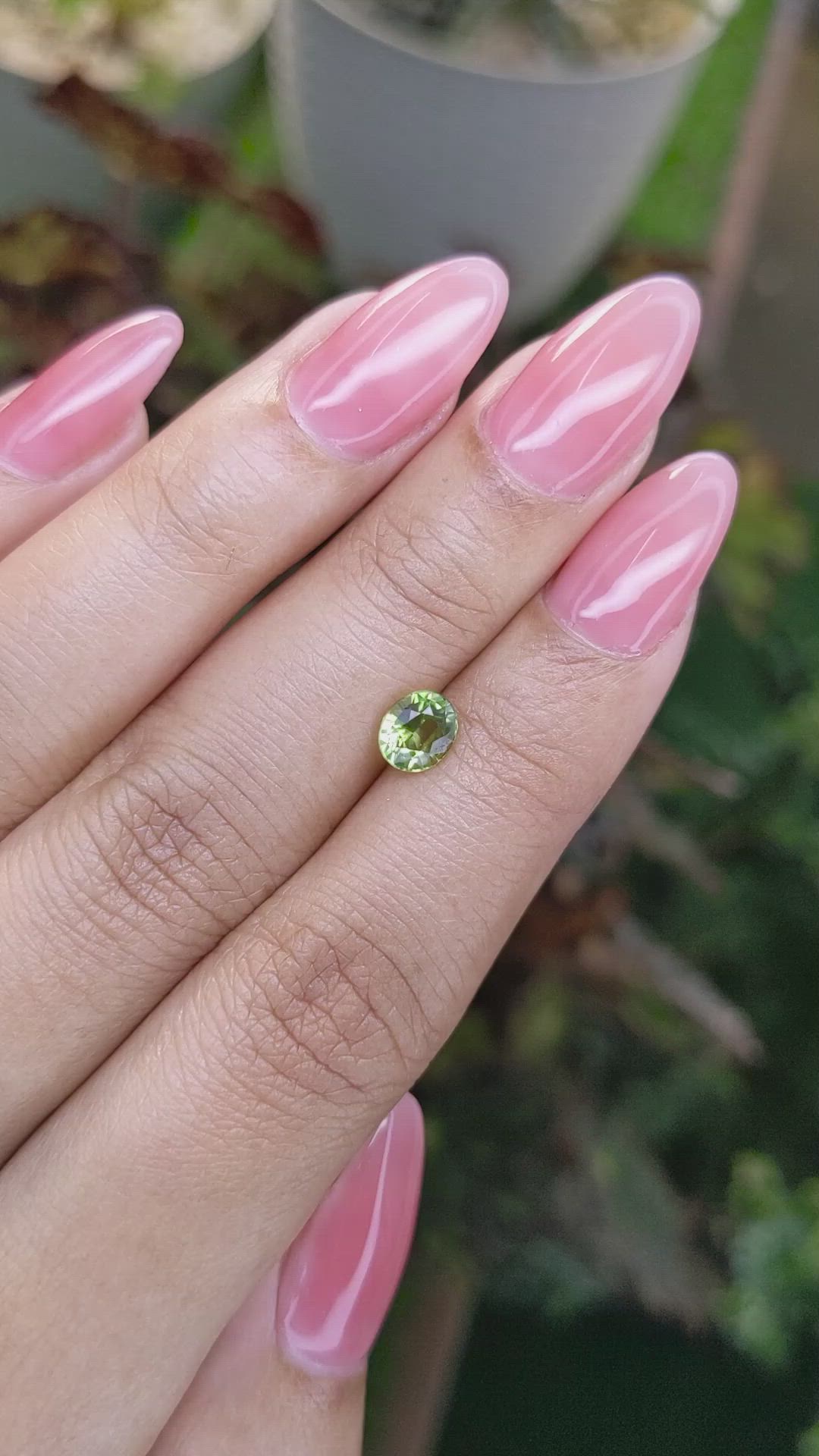0.86 Ct. Yellowish Green Sapphire from Madagascar Size Video