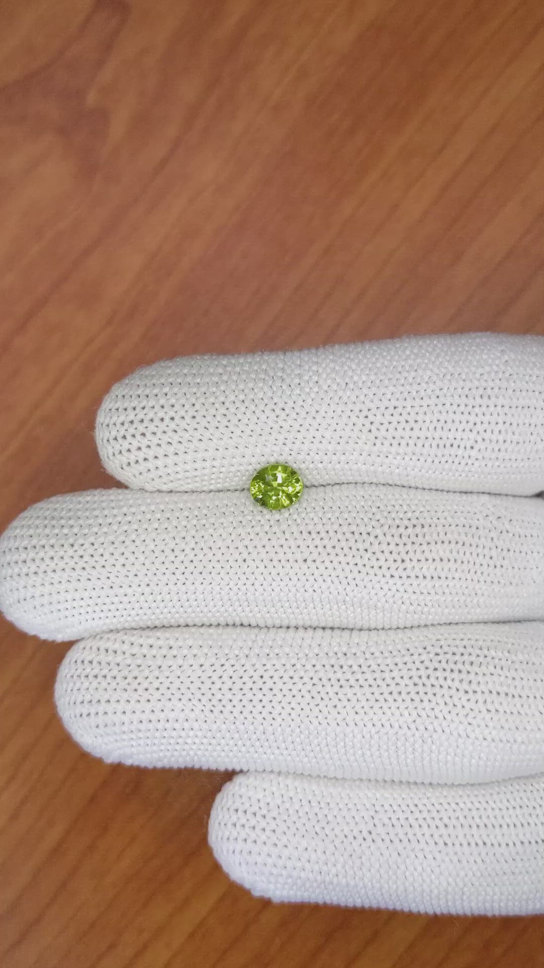 0.86 Ct. Yellowish Green Sapphire from Madagascar Size Video