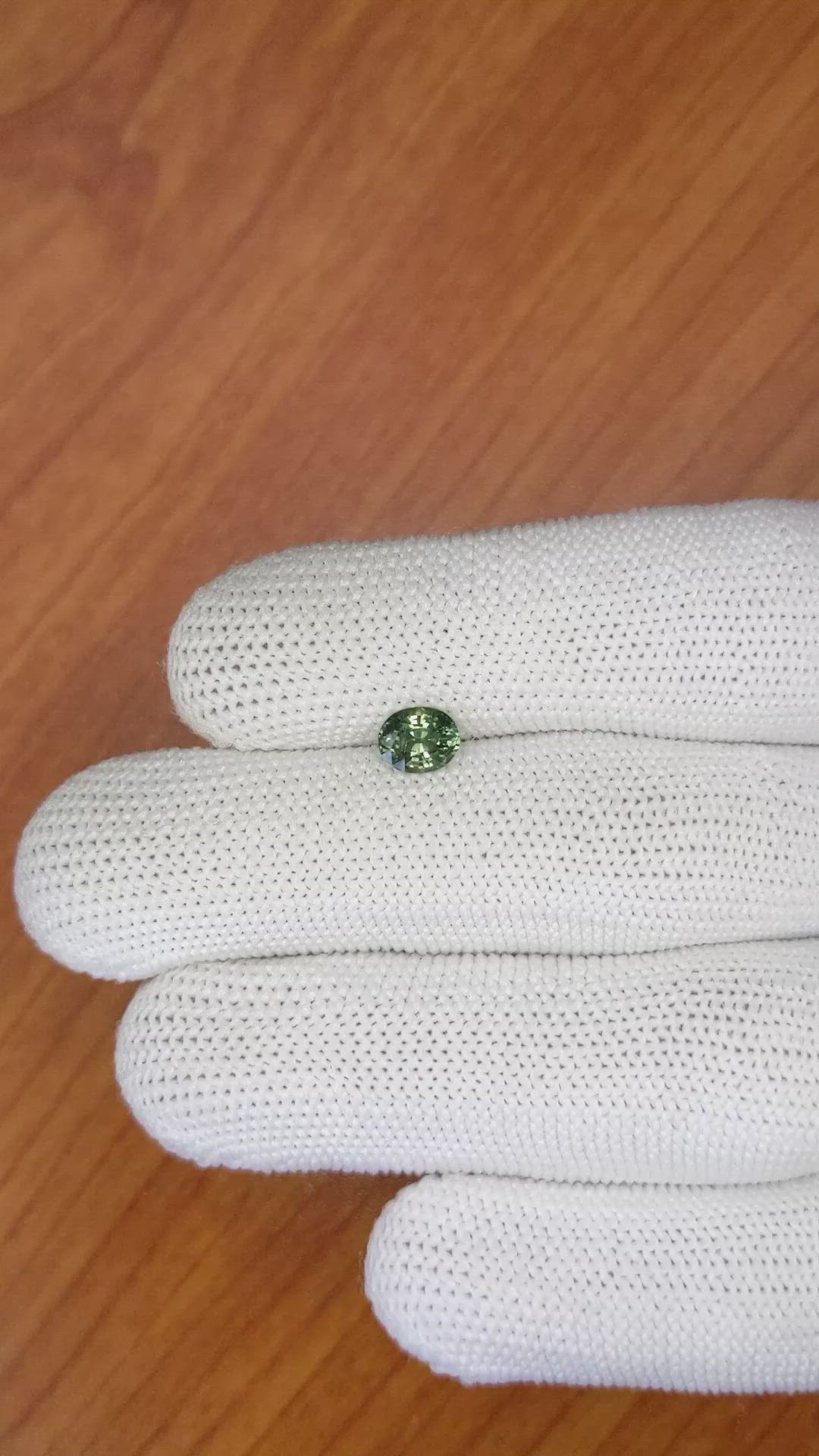 0.91 Ct. Bluish Green Sapphire from Madagascar Size Video