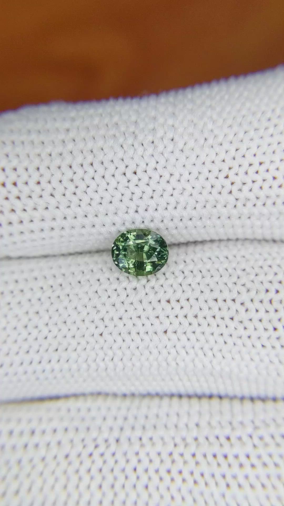 0.91 Ct. Bluish Green Sapphire from Madagascar Size Video
