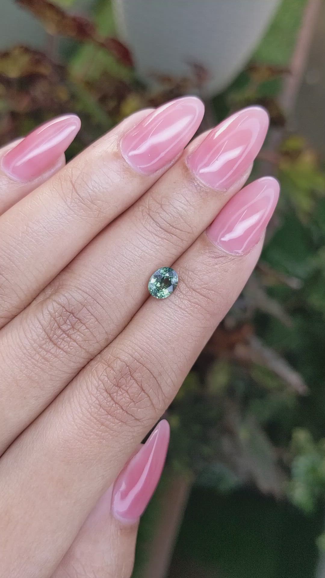 0.91 Ct. Bluish Green Sapphire from Madagascar Size Video
