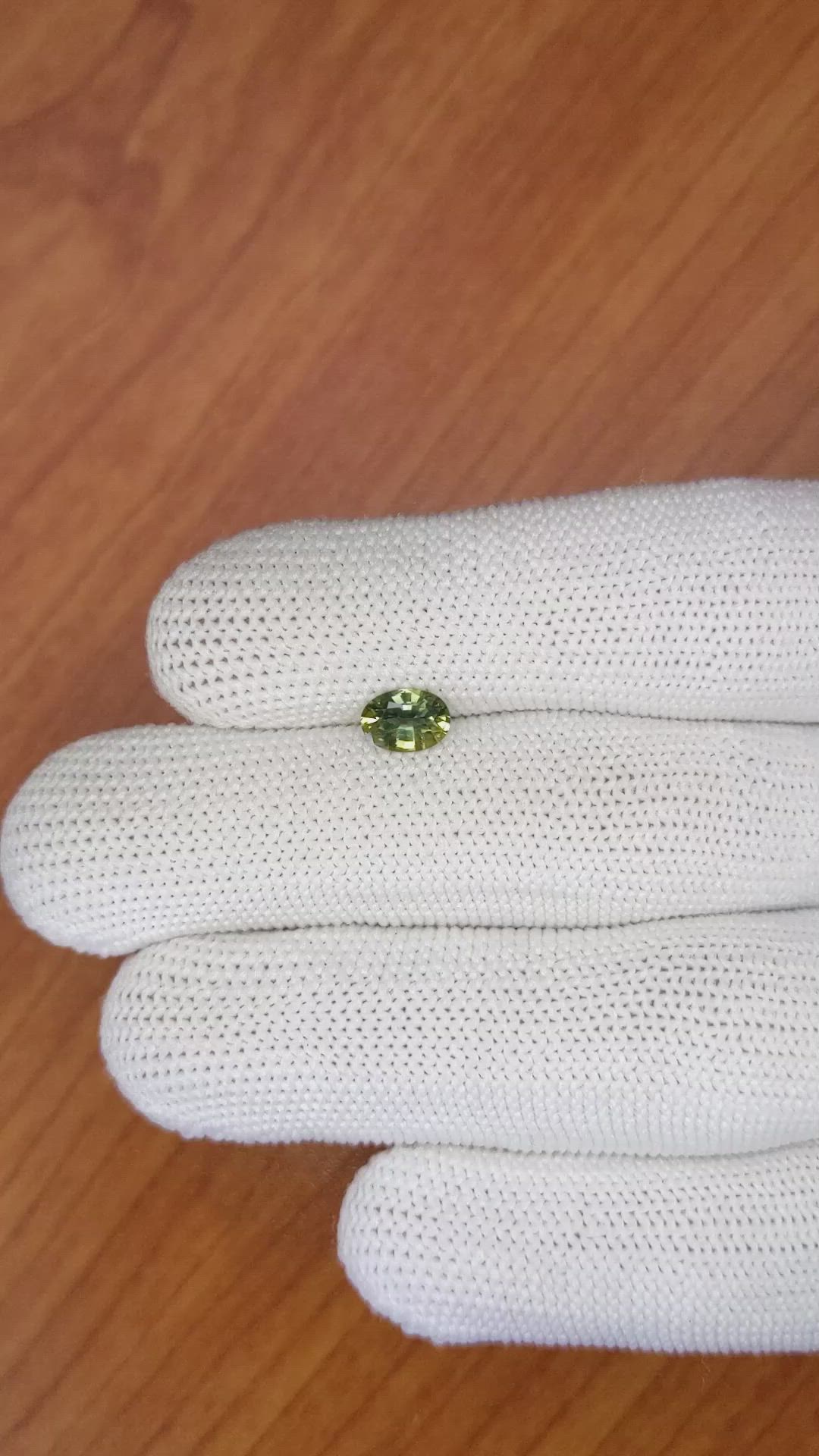 0.82 Ct. Yellowish Green Sapphire from Madagascar Size Video