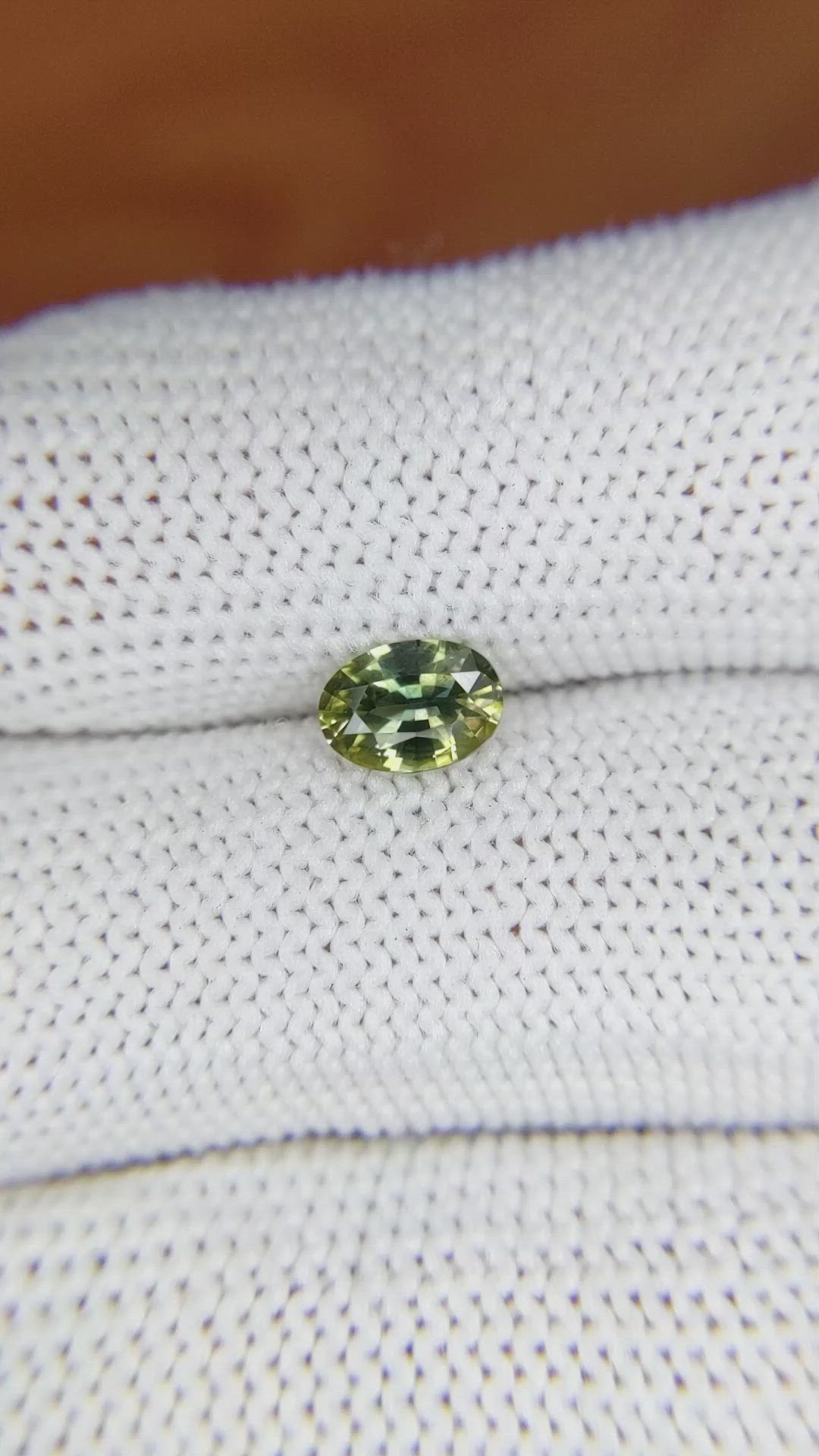 0.82 Ct. Yellowish Green Sapphire from Madagascar Size Video