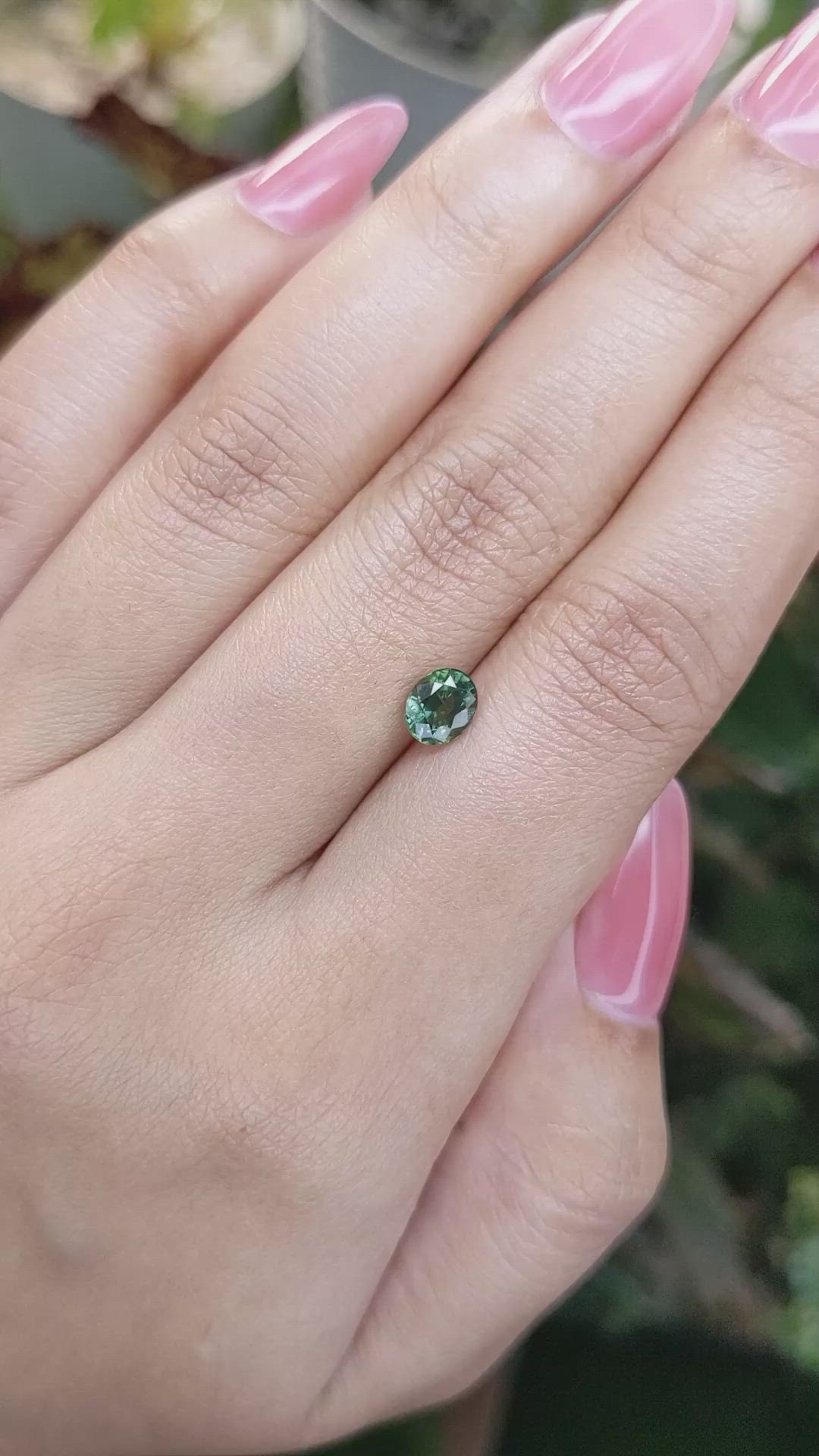 0.91 Ct. Bluish Green Sapphire from Madagascar Size Video