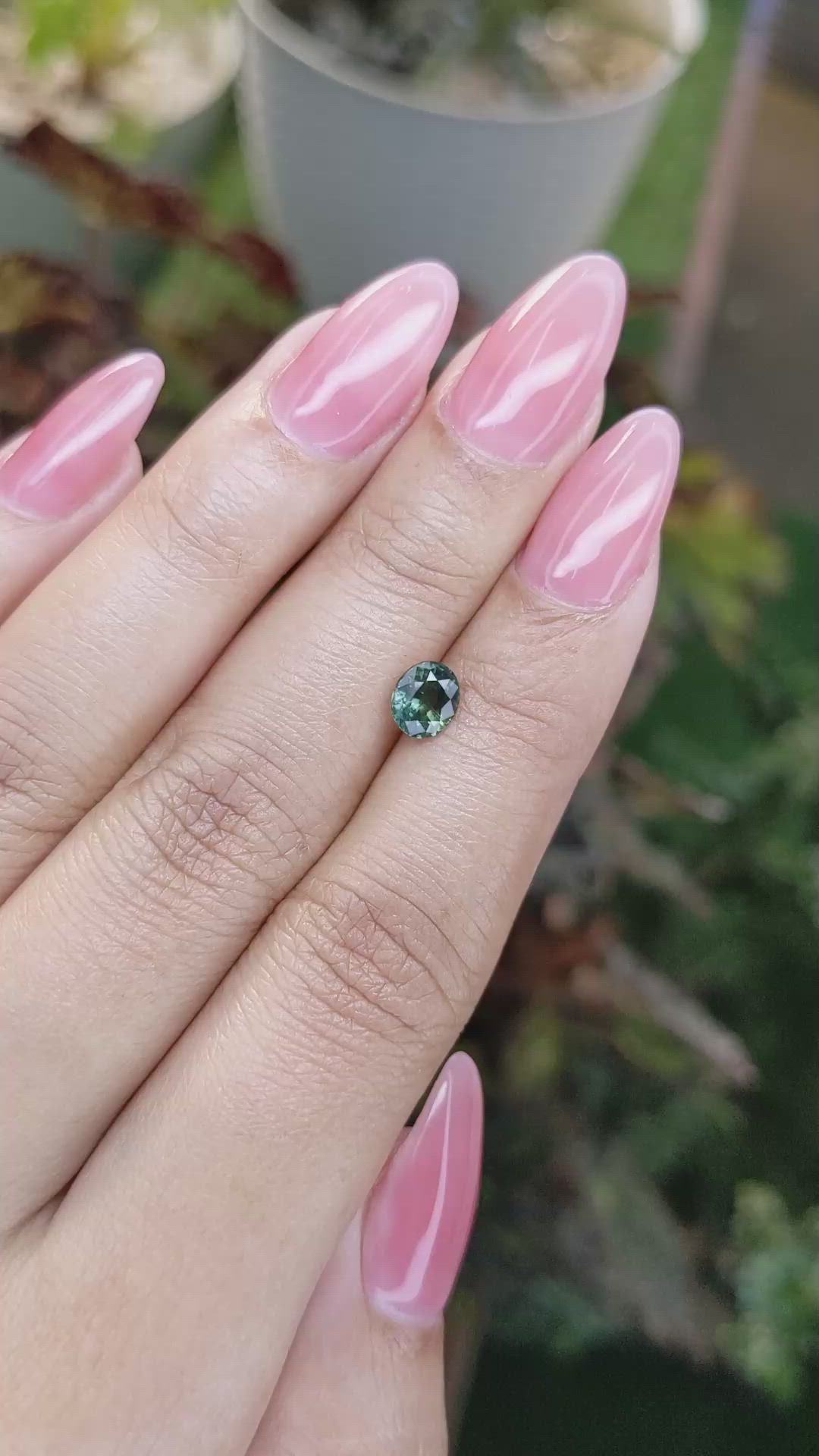 0.91 Ct. Bluish Green Sapphire from Madagascar Size Video