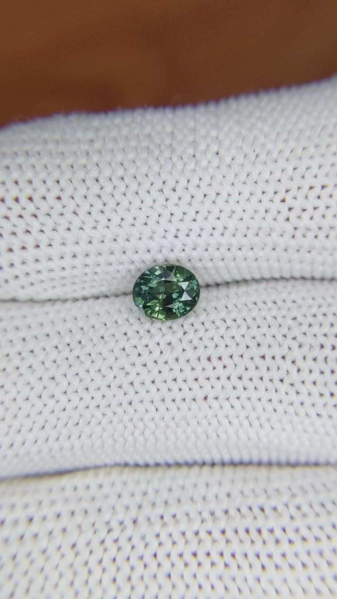 0.91 Ct. Bluish Green Sapphire from Madagascar Size Video