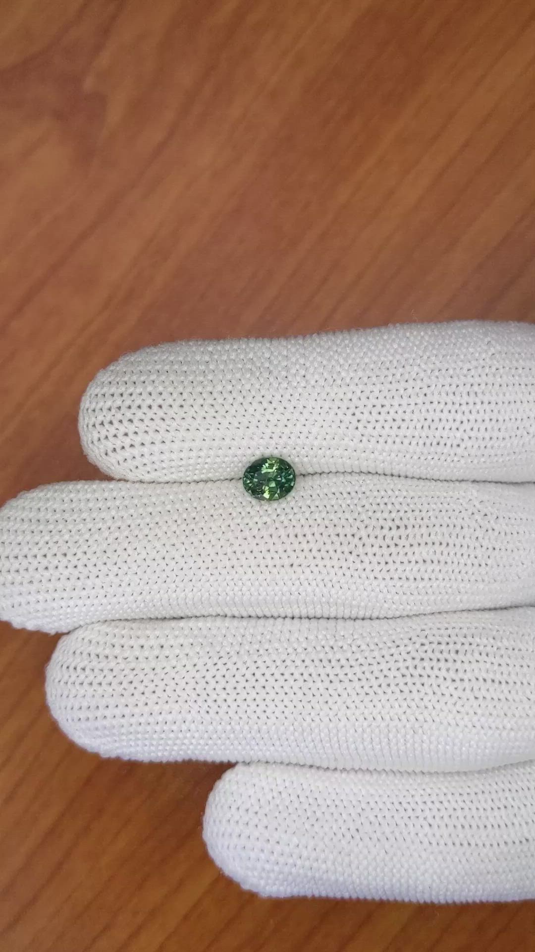 0.91 Ct. Bluish Green Sapphire from Madagascar Size Video