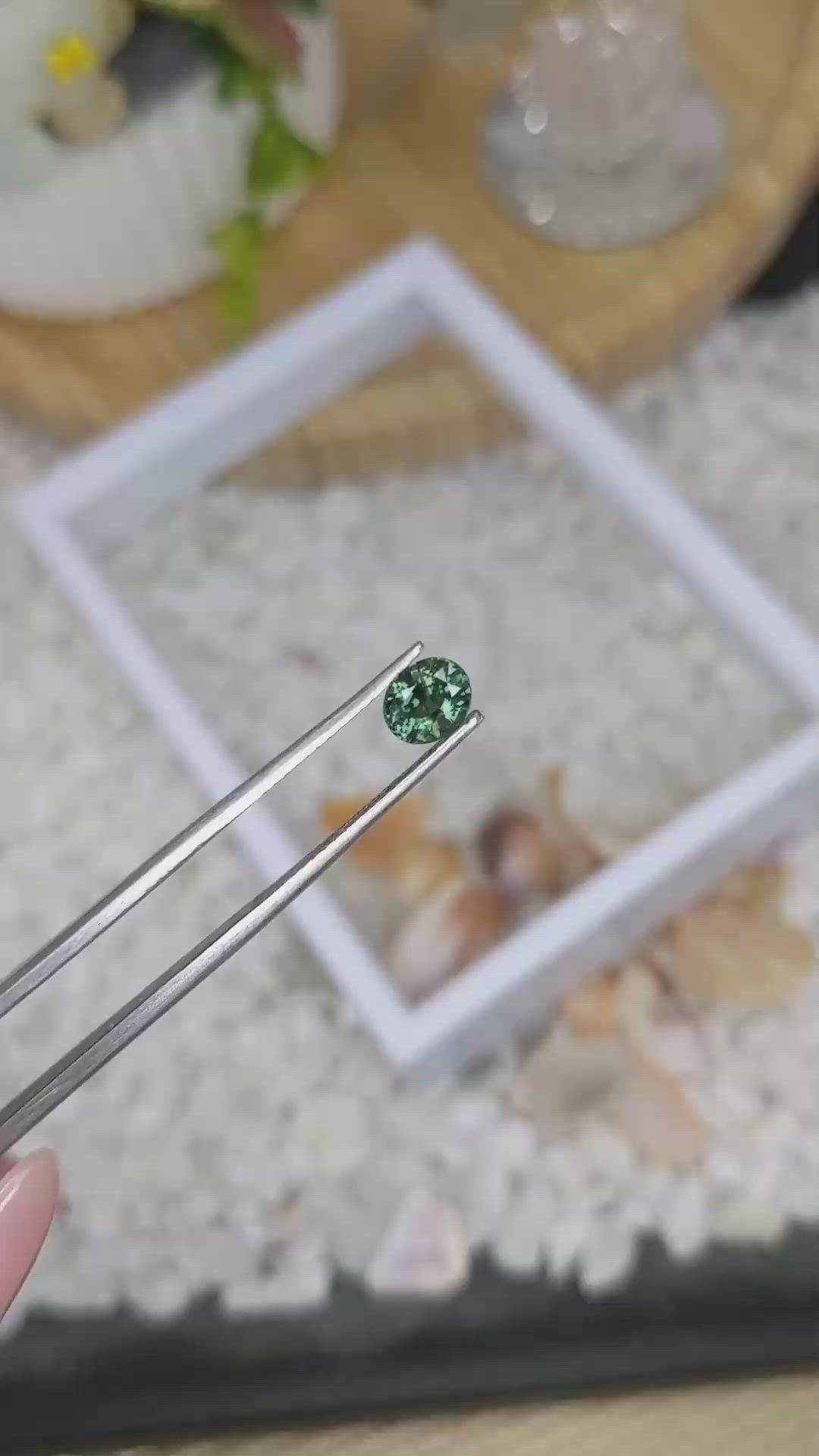 0.91 Ct. Bluish Green Sapphire from Madagascar Size Video