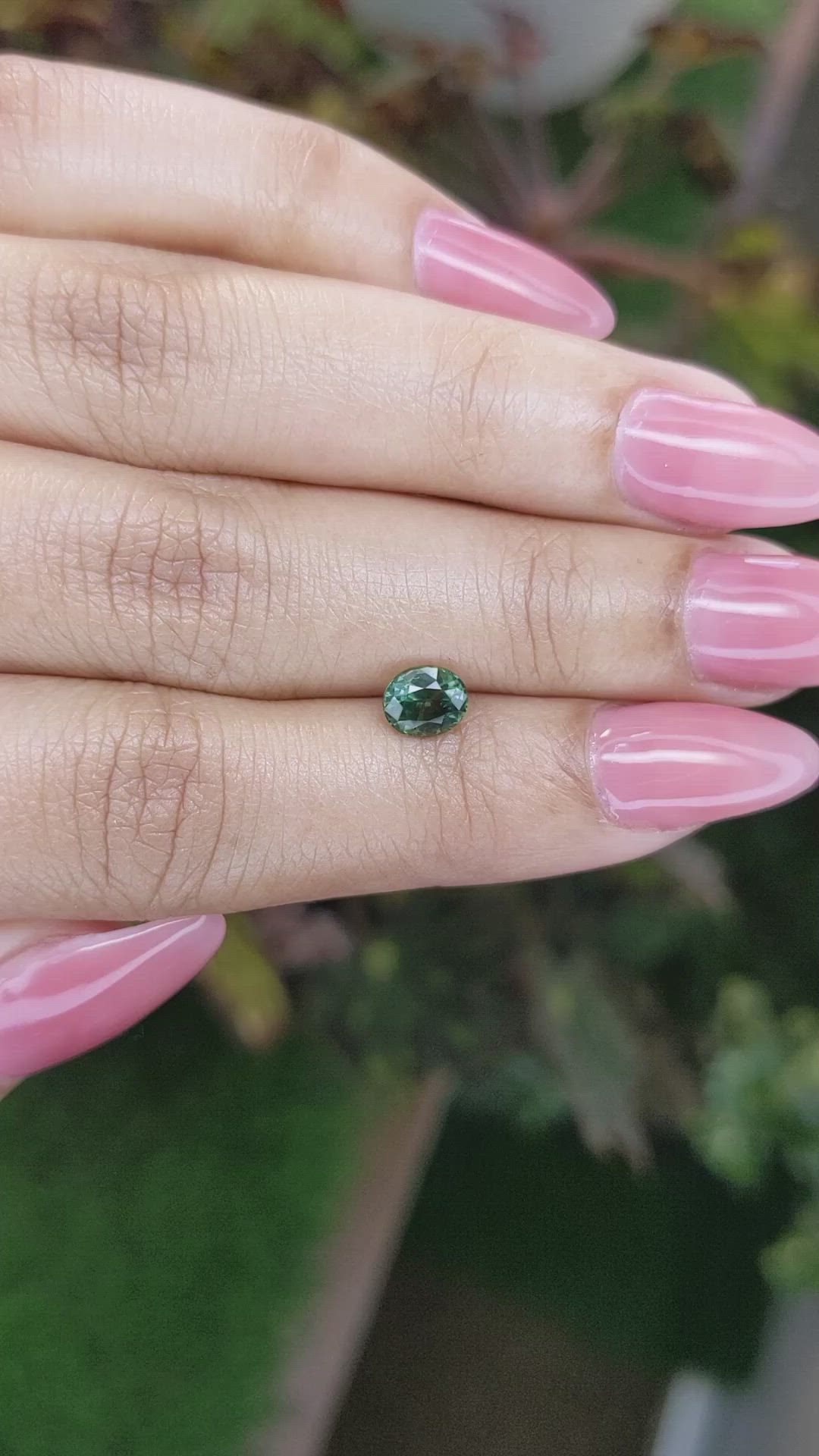0.91 Ct. Bluish Green Sapphire from Madagascar Size Video