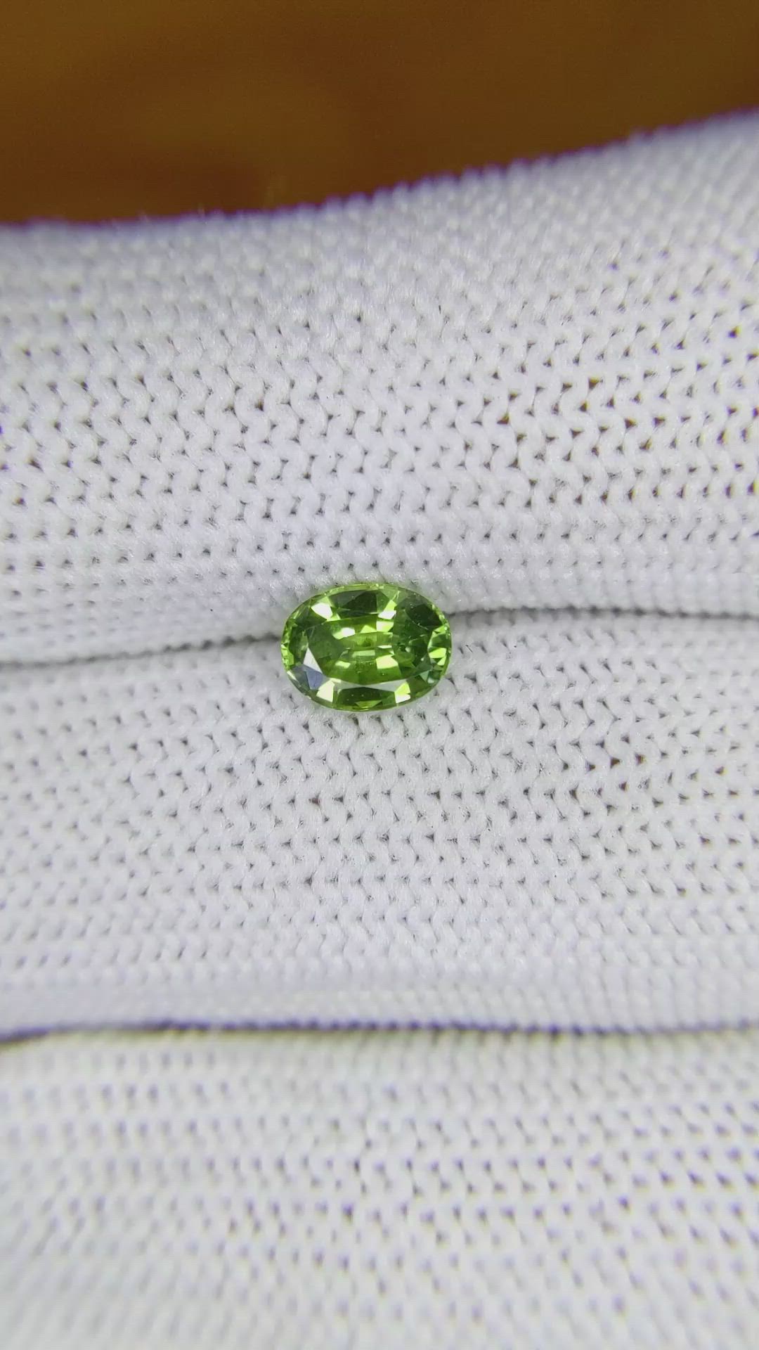0.91 Ct. Yellowish Green Sapphire from Madagascar Size Video