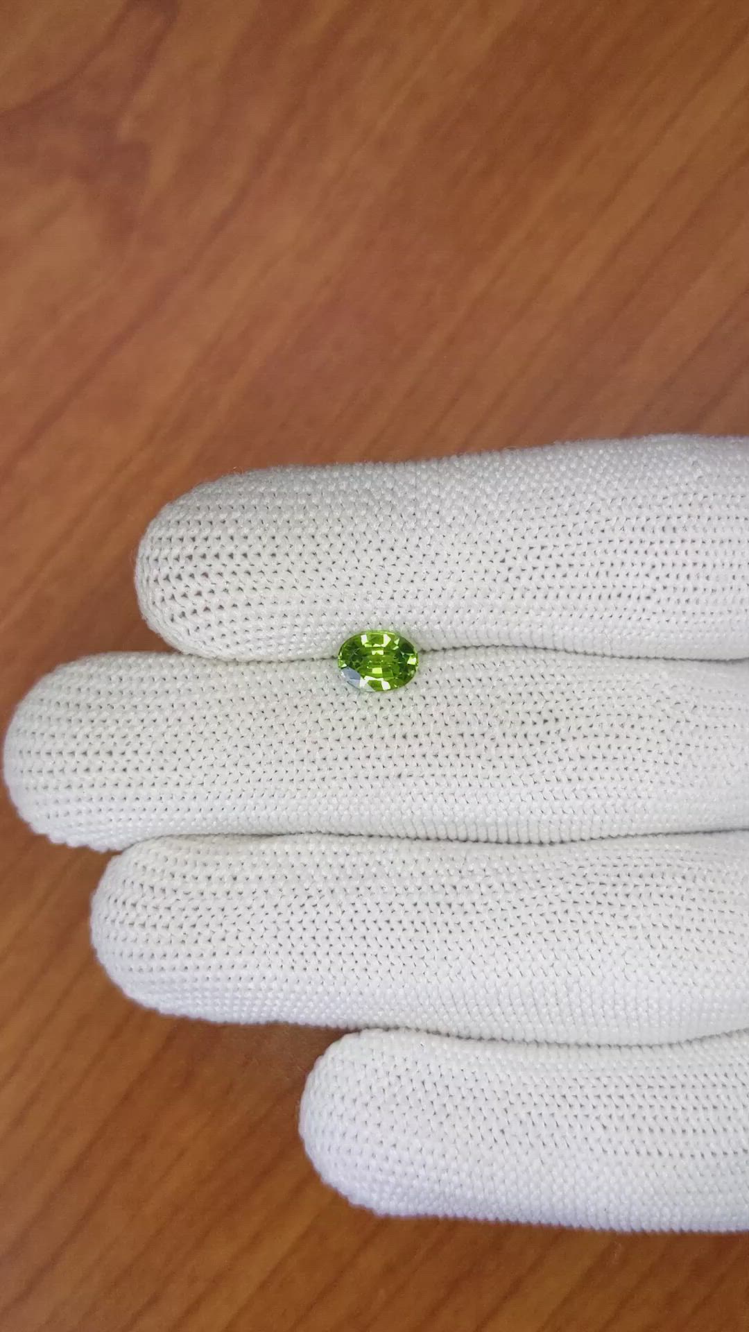 0.91 Ct. Yellowish Green Sapphire from Madagascar Size Video