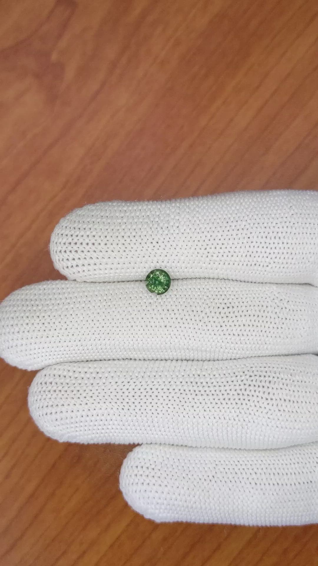 0.57 Ct. Bluish Green Sapphire from Madagascar Size Video