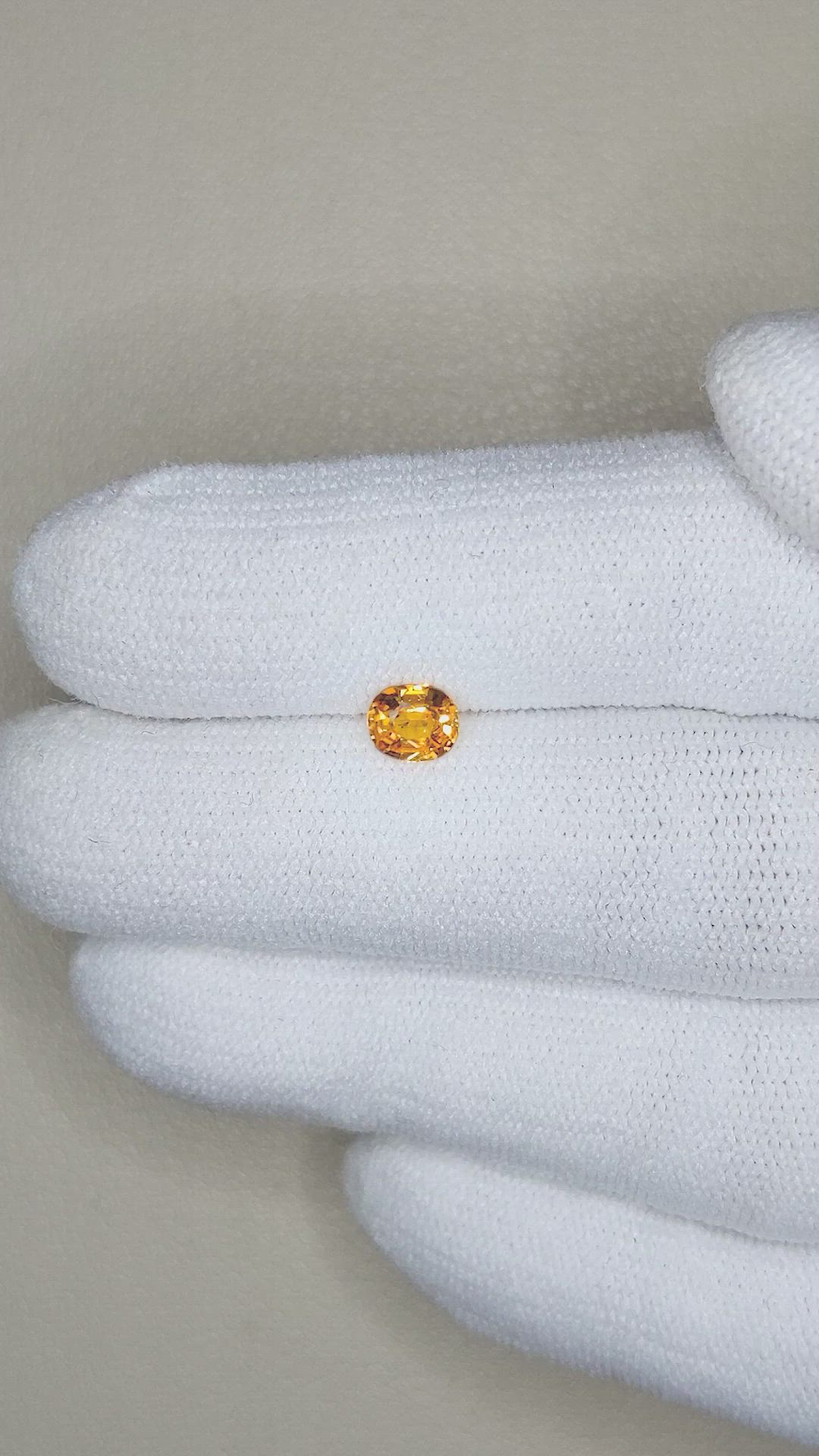 0.50 Ct. Yellowish Orange Sapphire from Ceylon (Sri Lanka) Size Video